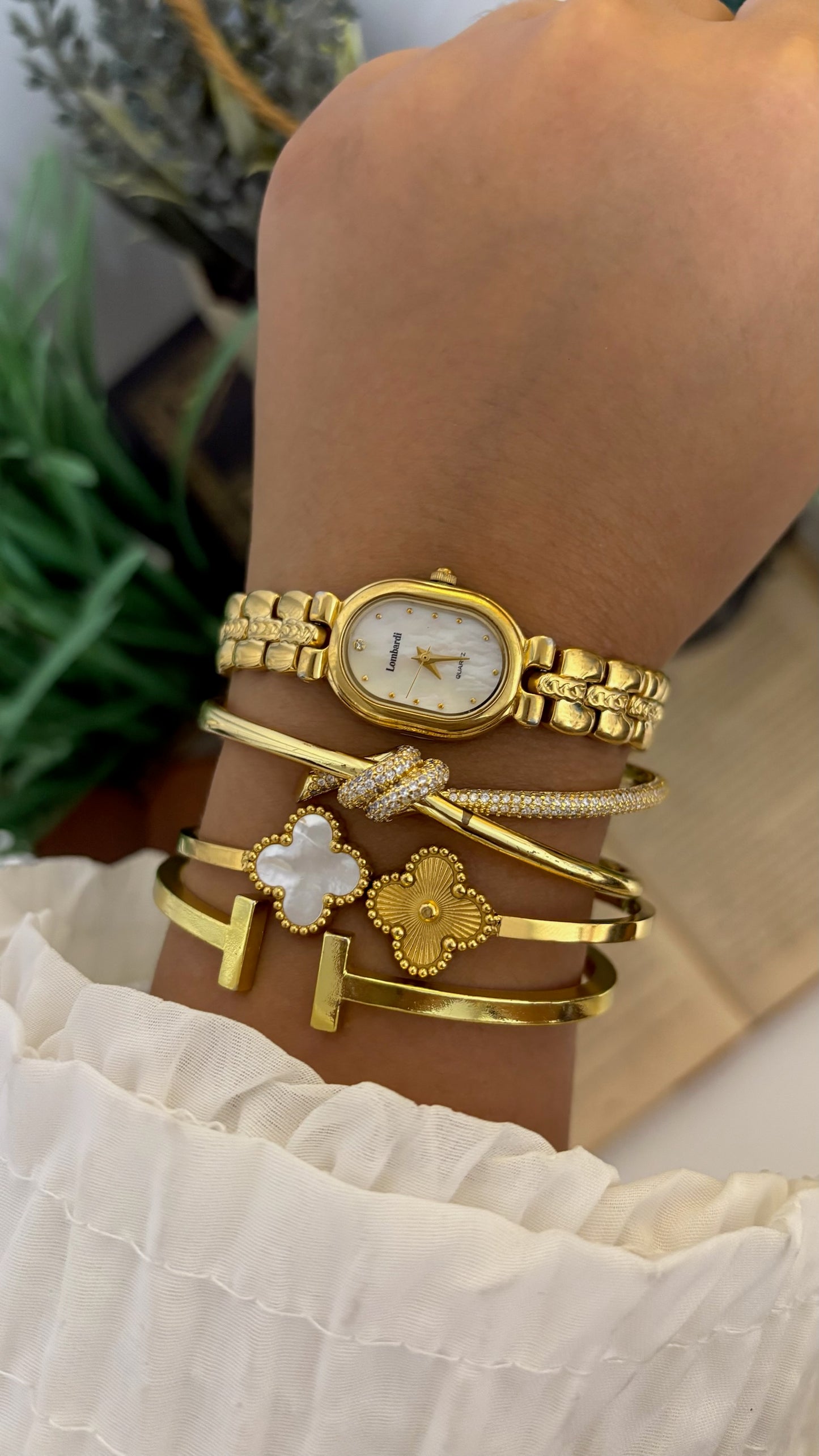 Vintage Lombardi Oval Mother of Pearl Dial Watch with Detailed H-Links in Gold Tone Quartz
