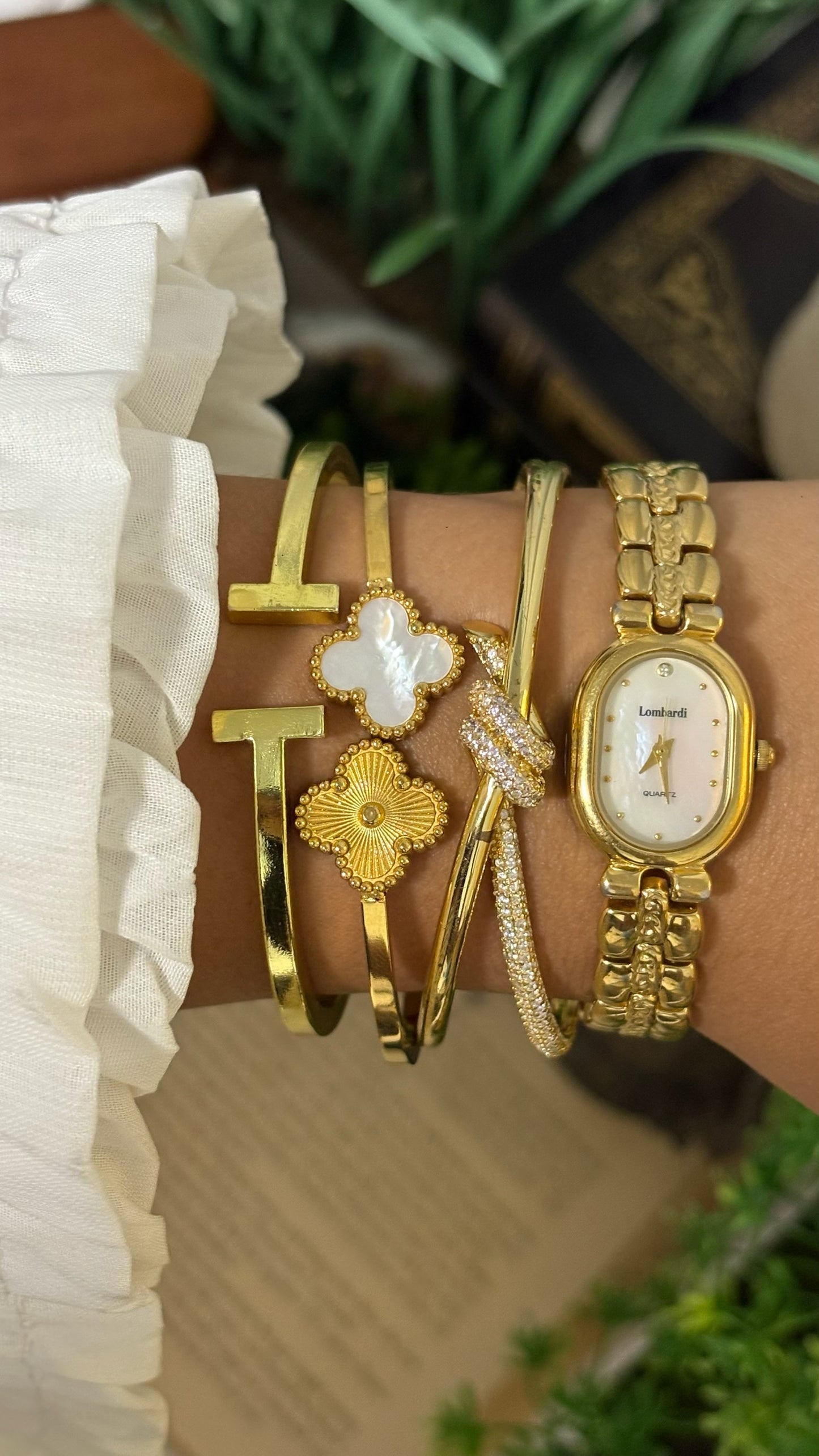 Vintage Lombardi Oval Mother of Pearl Dial Watch with Detailed H-Links in Gold Tone Quartz