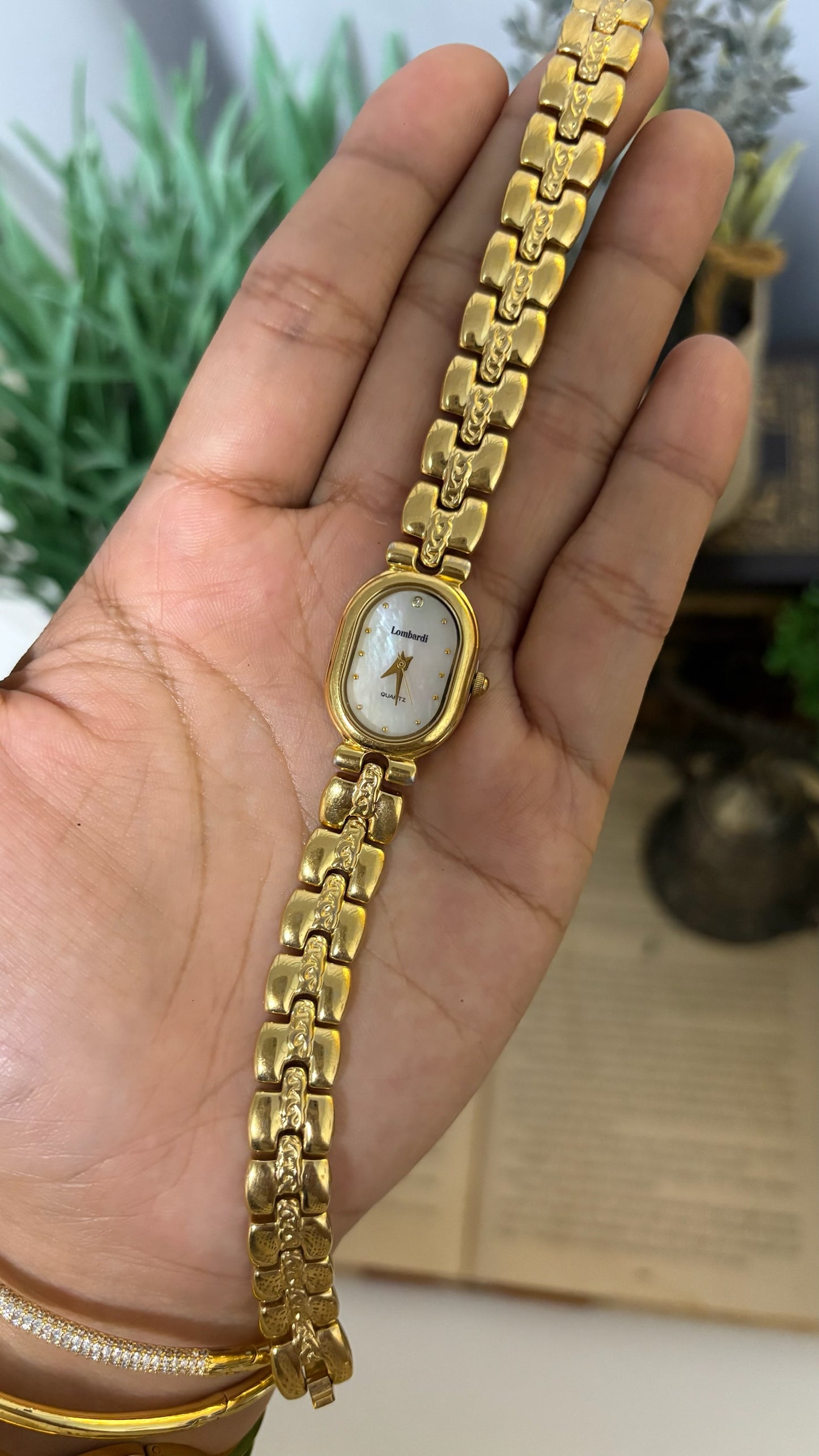 Vintage Lombardi Oval Mother of Pearl Dial Watch with Detailed H-Links in Gold Tone Quartz