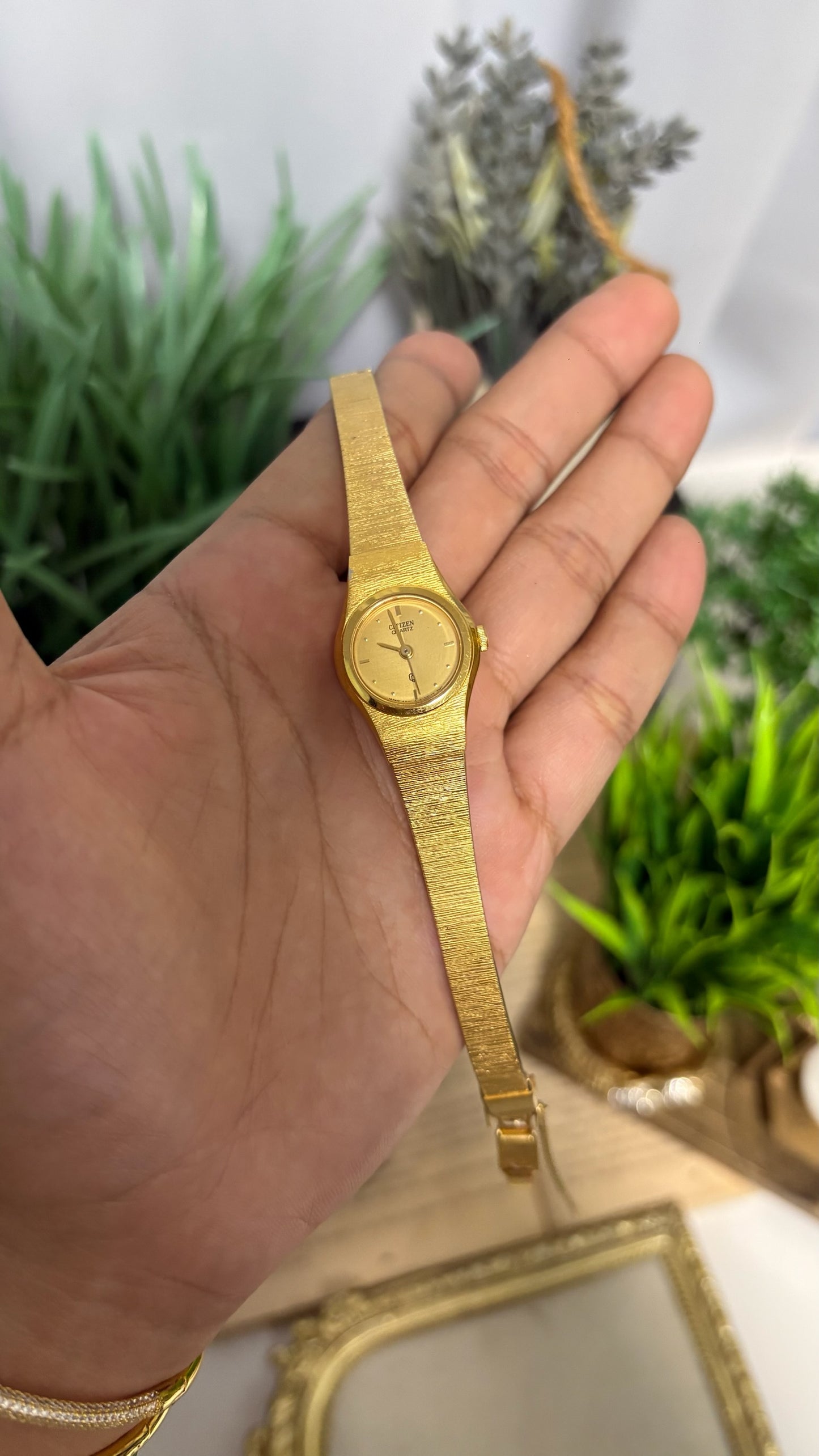 Vintage Citizen Oval Watch with Gold Tone Bark Textured Integrated Strap.
