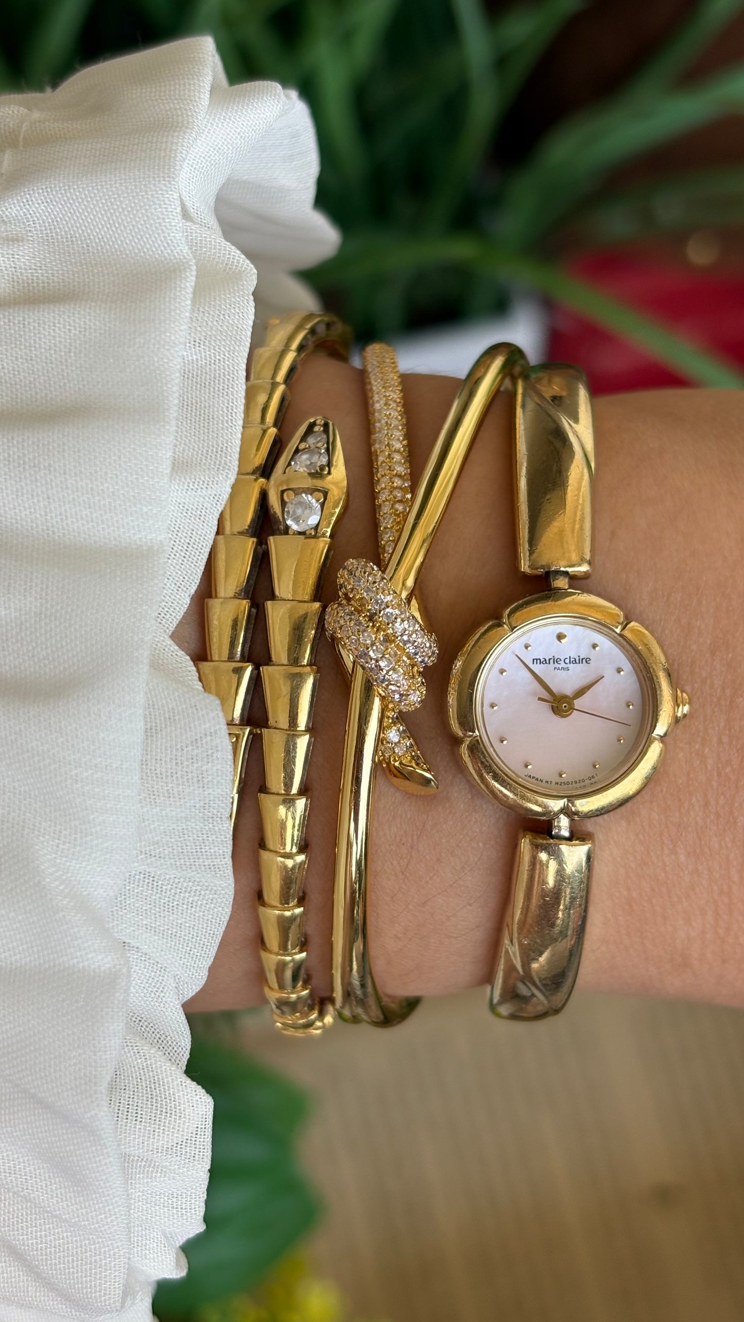Vintage Marie Claire Watch in Gold Tone Flower Bezel Pink Pearl Dial
