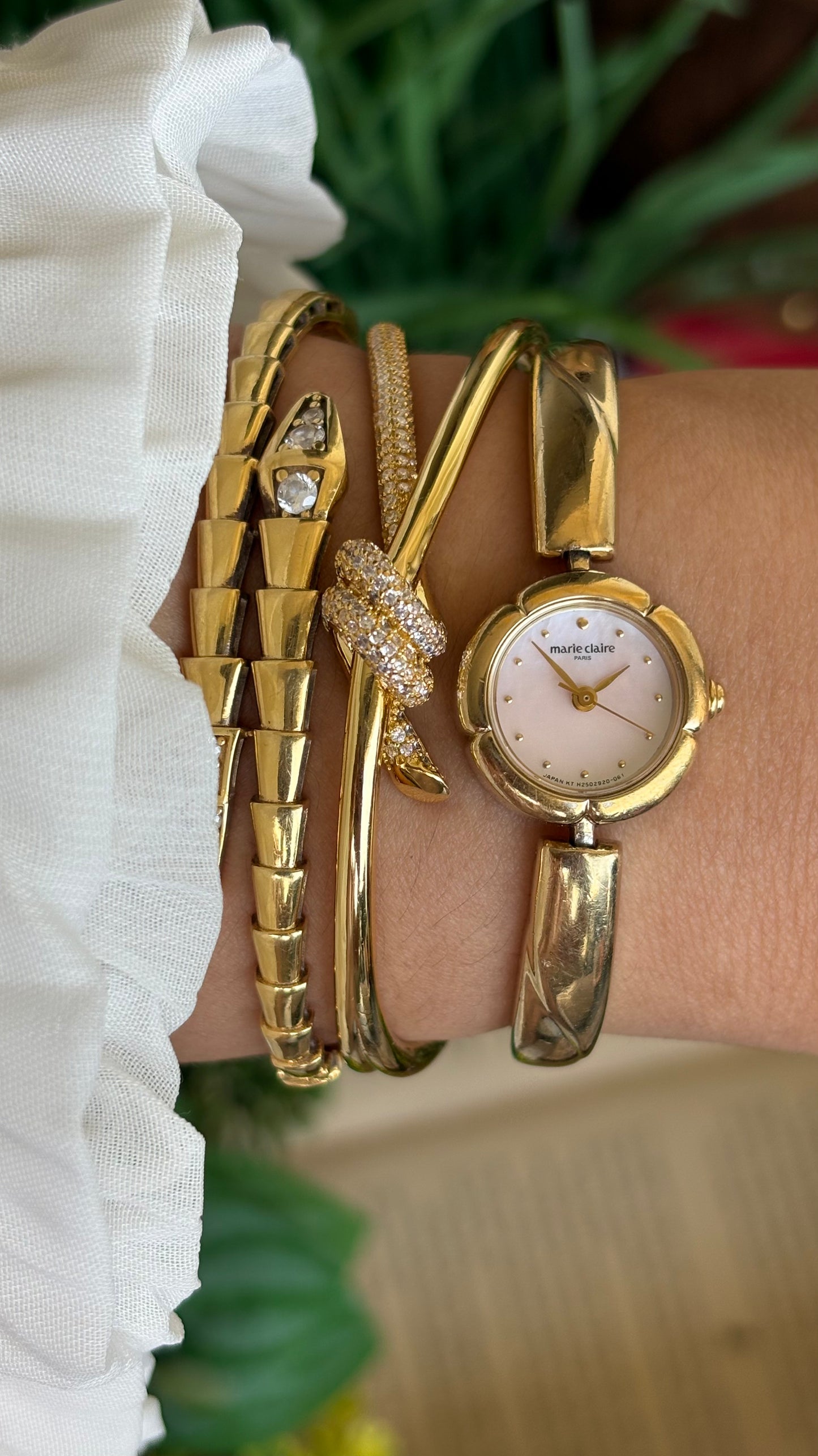 Vintage Marie Claire Watch in Gold Tone Flower Bezel Pink Pearl Dial