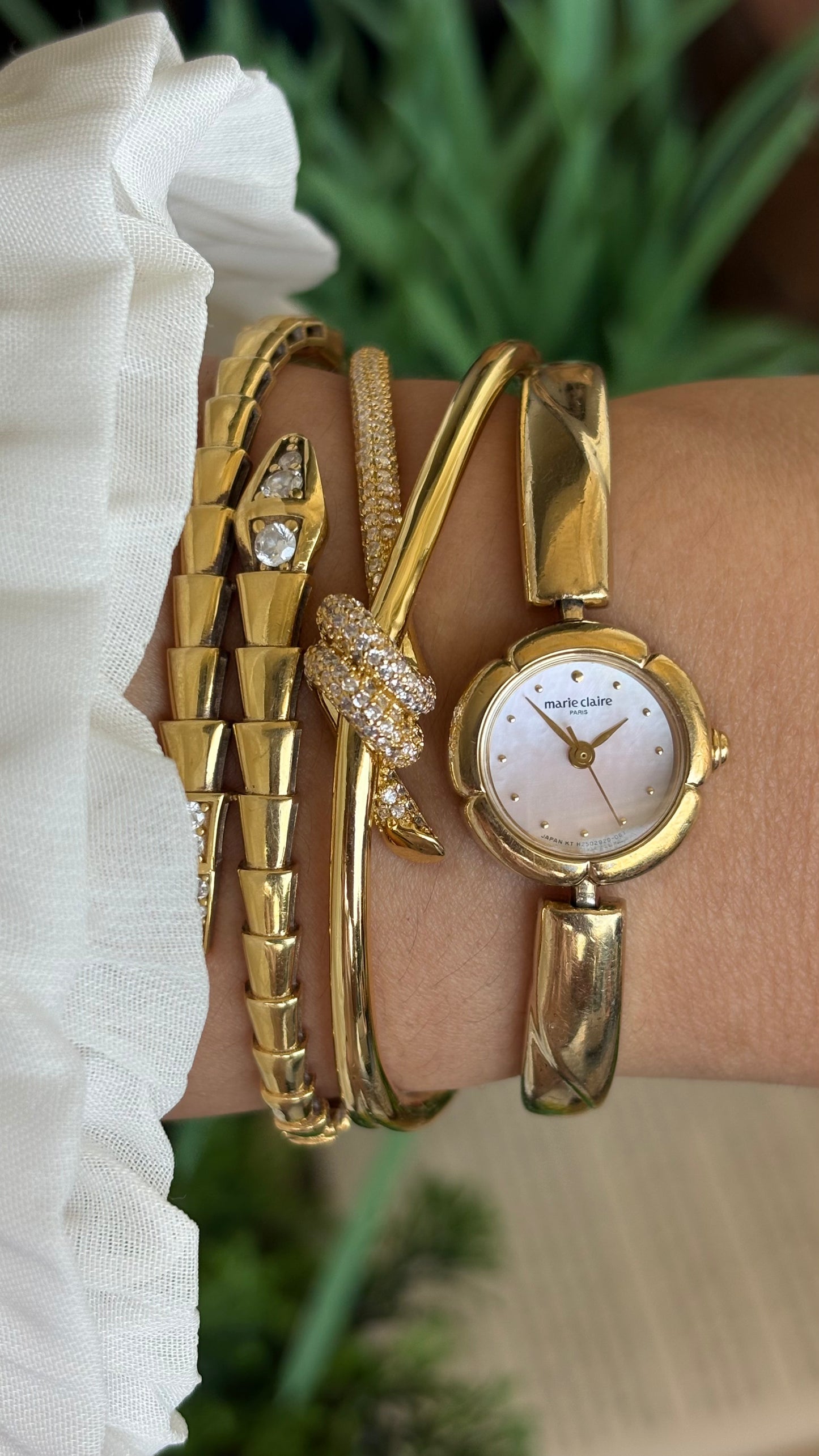 Vintage Marie Claire Watch in Gold Tone Flower Bezel Pink Pearl Dial