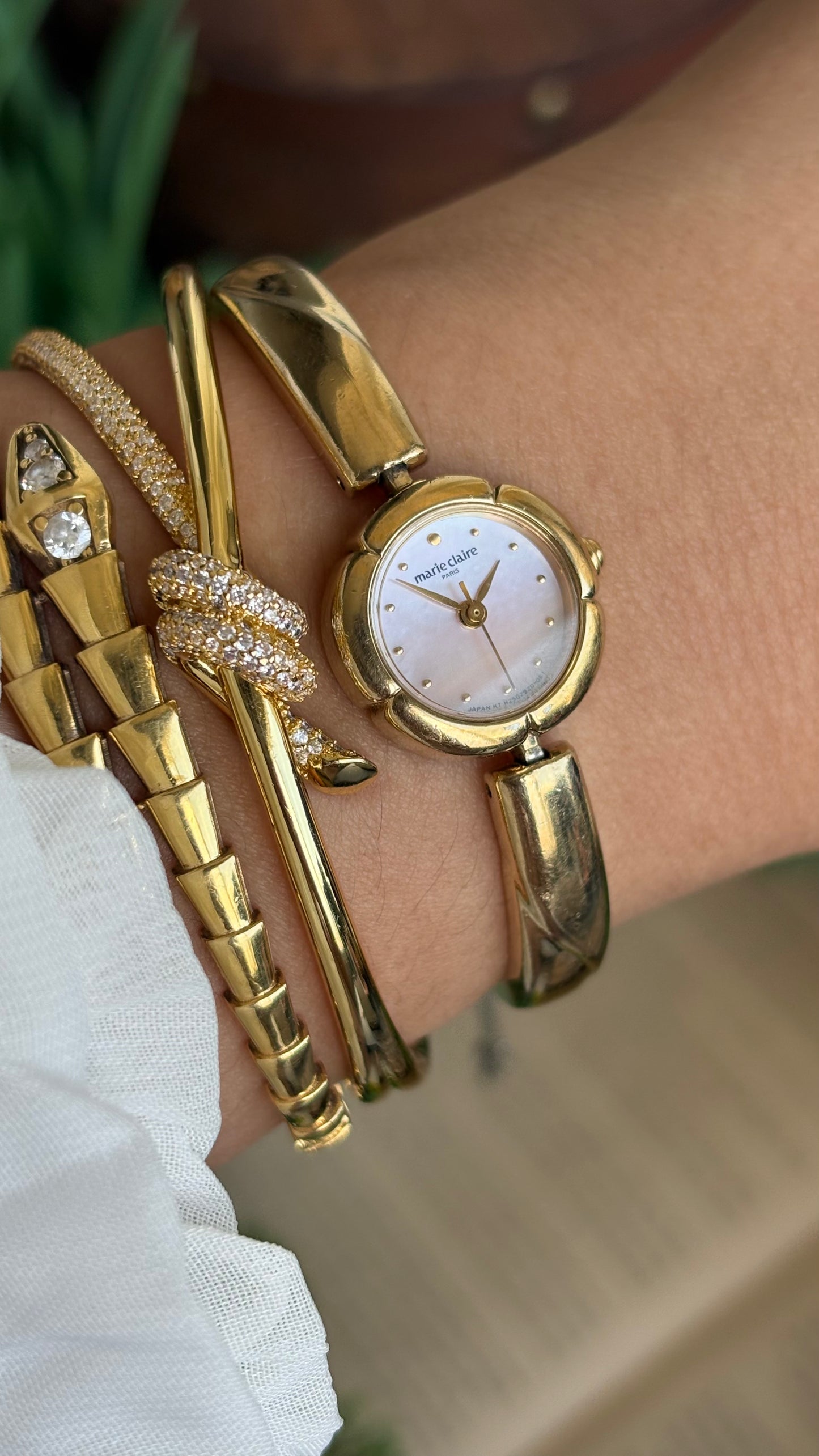 Vintage Marie Claire Watch in Gold Tone Flower Bezel Pink Pearl Dial