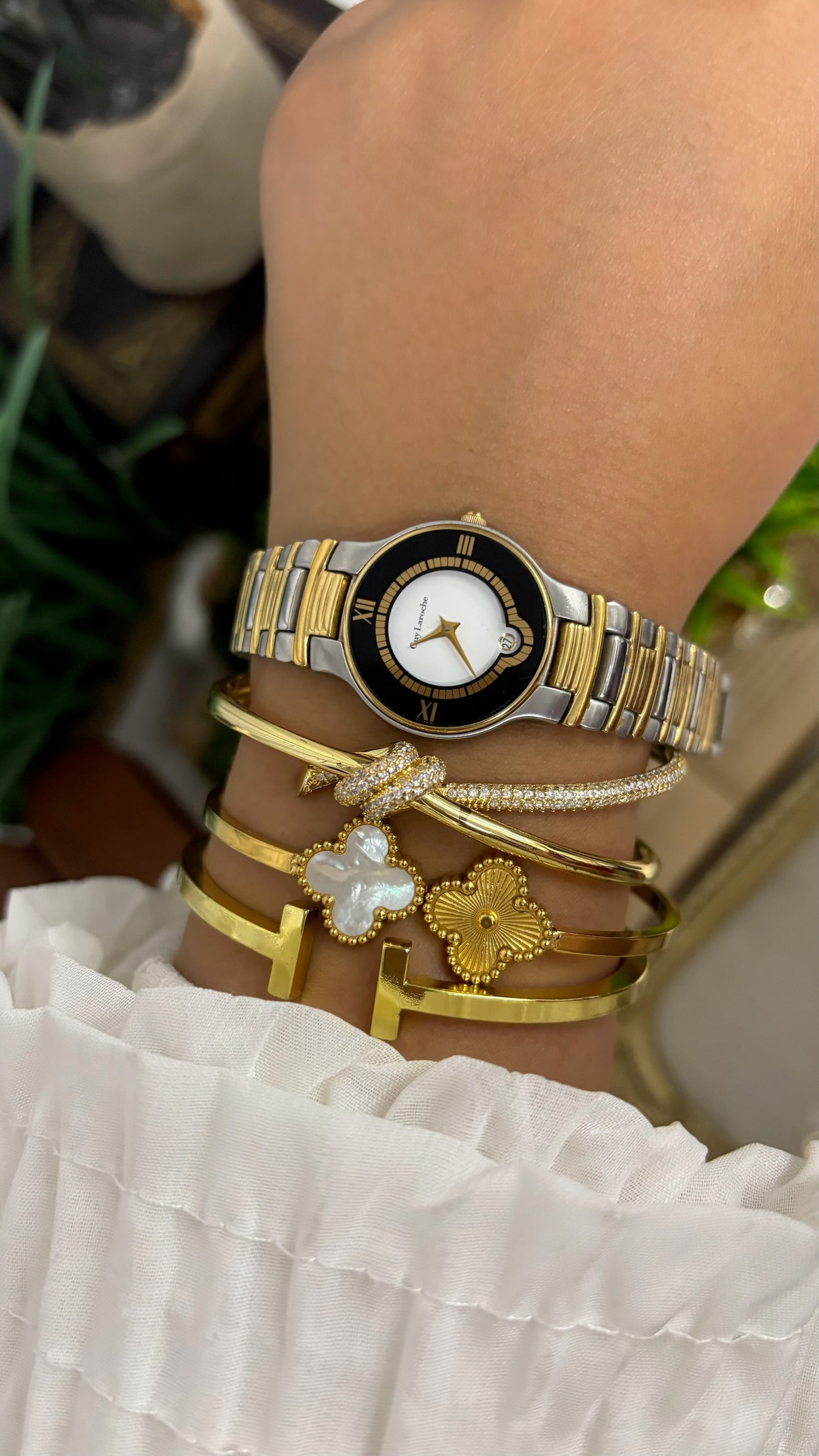 Vintage Guy Laroche Round Watch with Black and Gold Tone Bezel and Two-Tone Link Bracelet