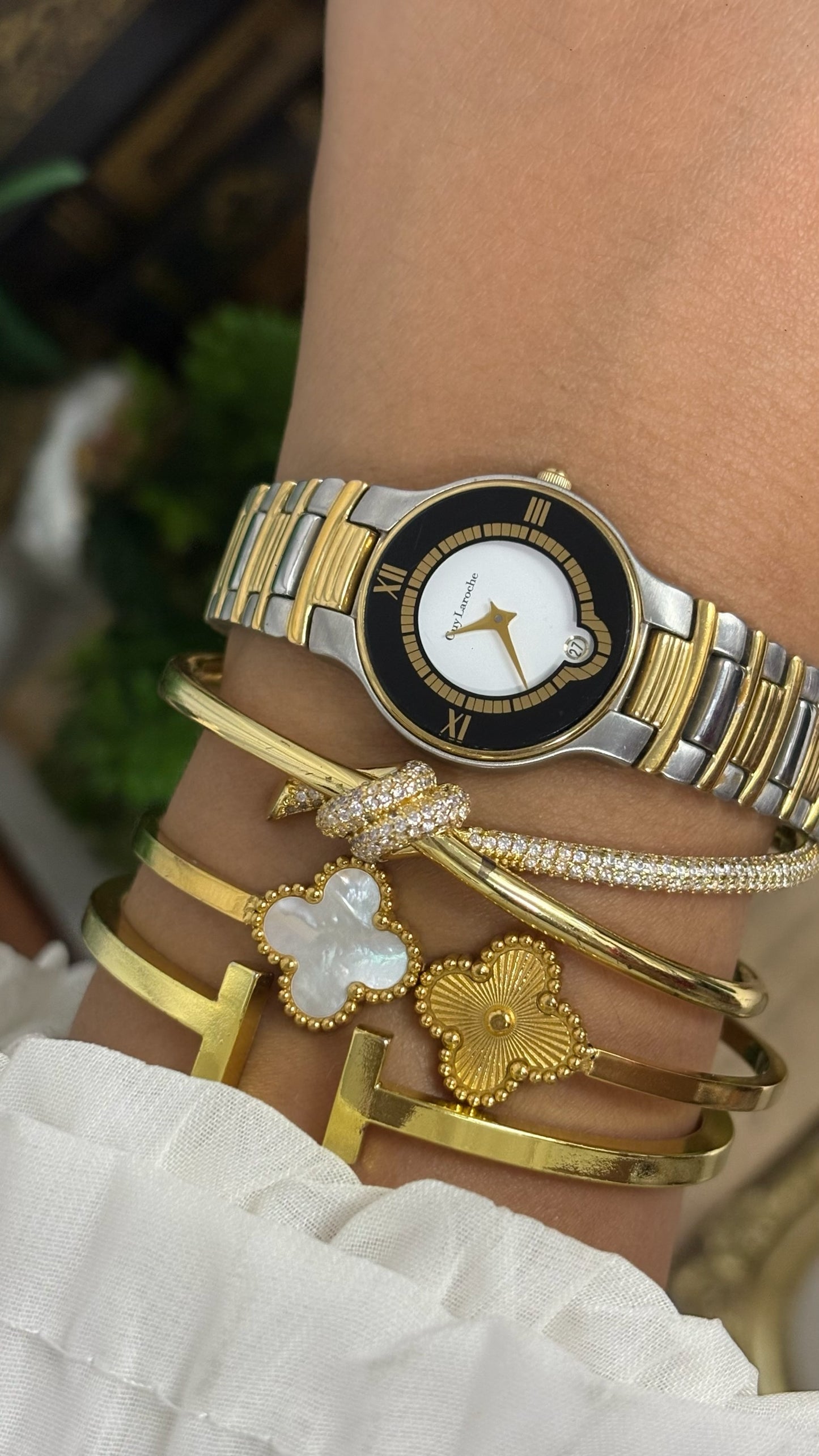 Vintage Guy Laroche Round Watch with Black and Gold Tone Bezel and Two-Tone Link Bracelet