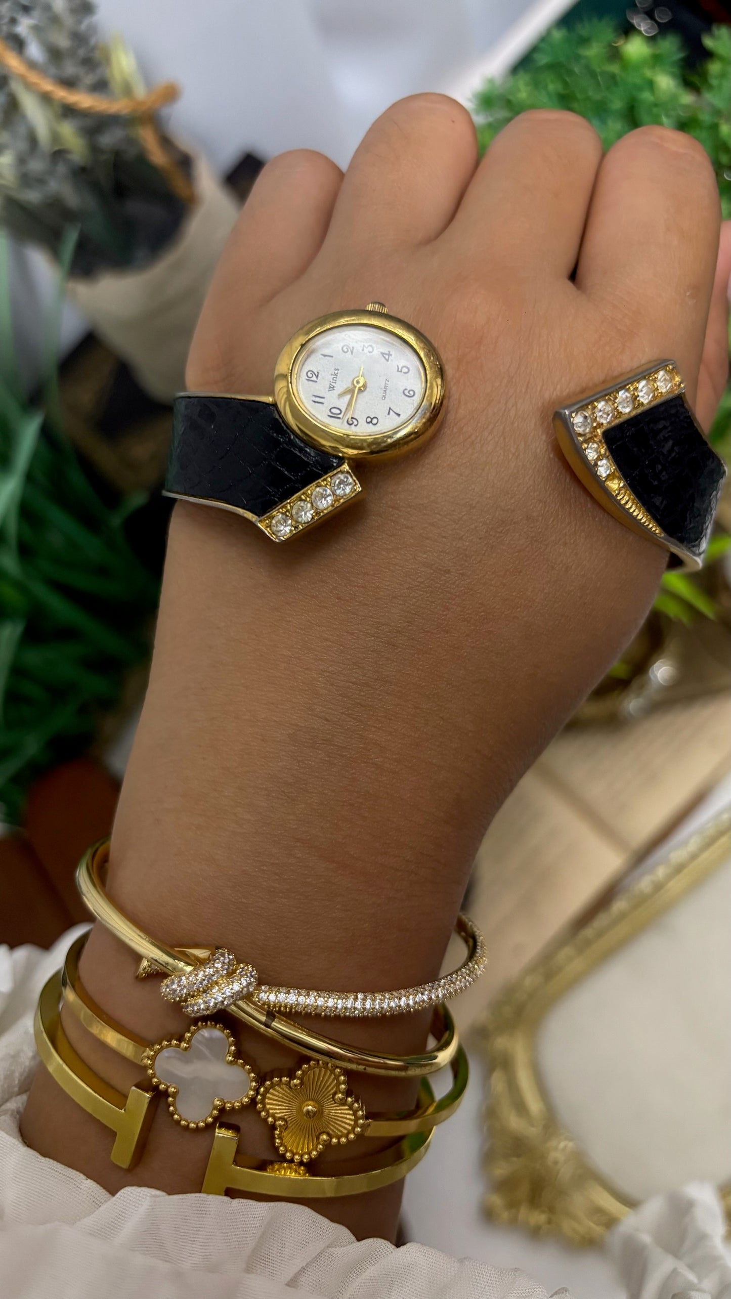 Vintage Winks Oval Watch with Crystal Accents and Black Faux-Leather Inlay Peekaboo Cuff Bracelet Quartz