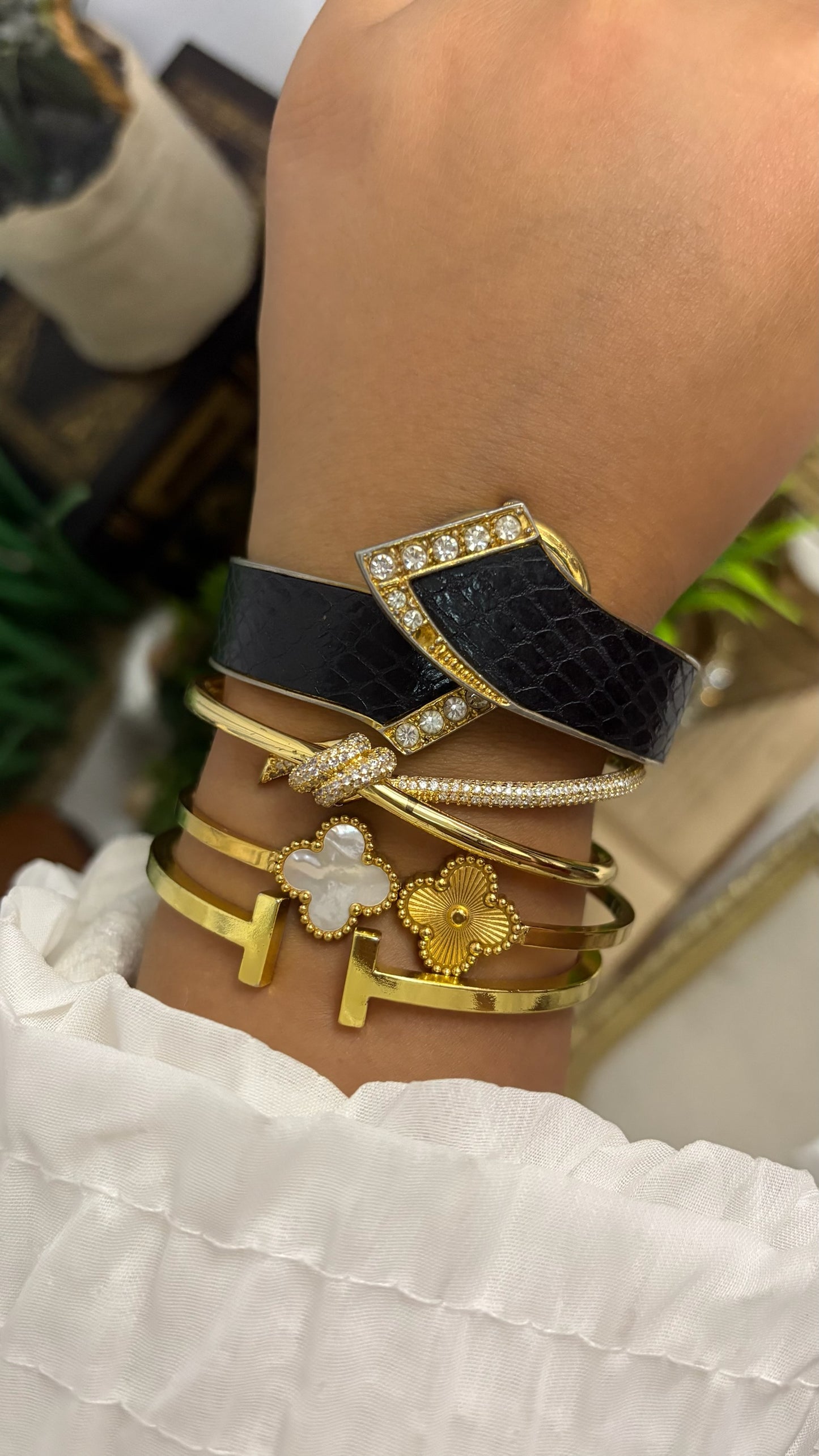 Vintage Winks Oval Watch with Crystal Accents and Black Faux-Leather Inlay Peekaboo Cuff Bracelet Quartz
