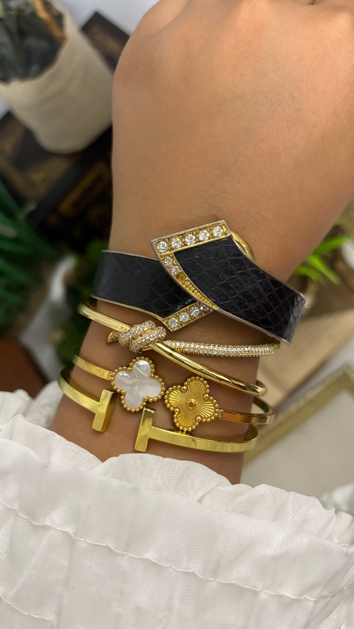Vintage Winks Oval Watch with Crystal Accents and Black Faux-Leather Inlay Peekaboo Cuff Bracelet Quartz