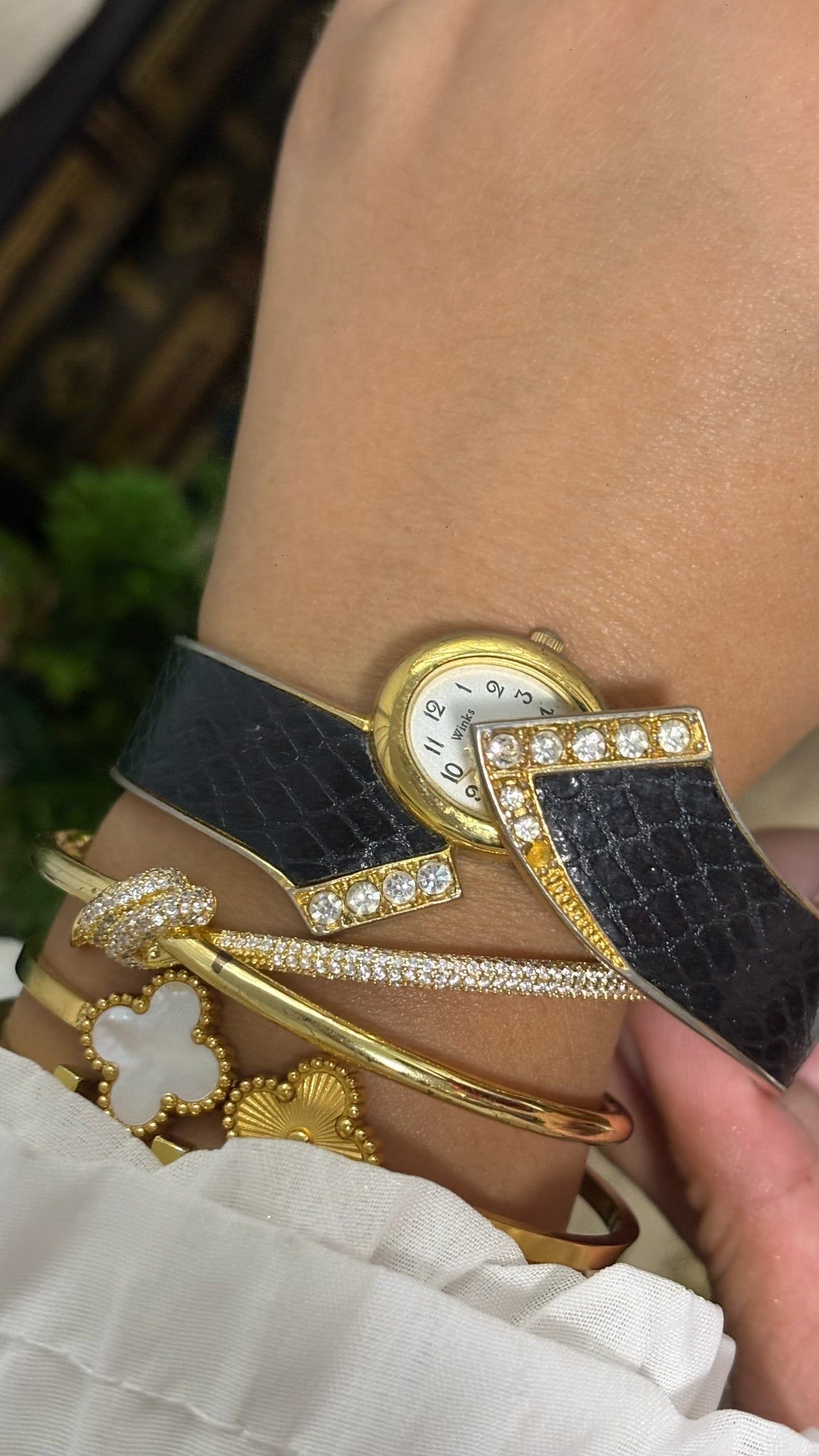 Vintage Winks Oval Watch with Crystal Accents and Black Faux-Leather Inlay Peekaboo Cuff Bracelet Quartz