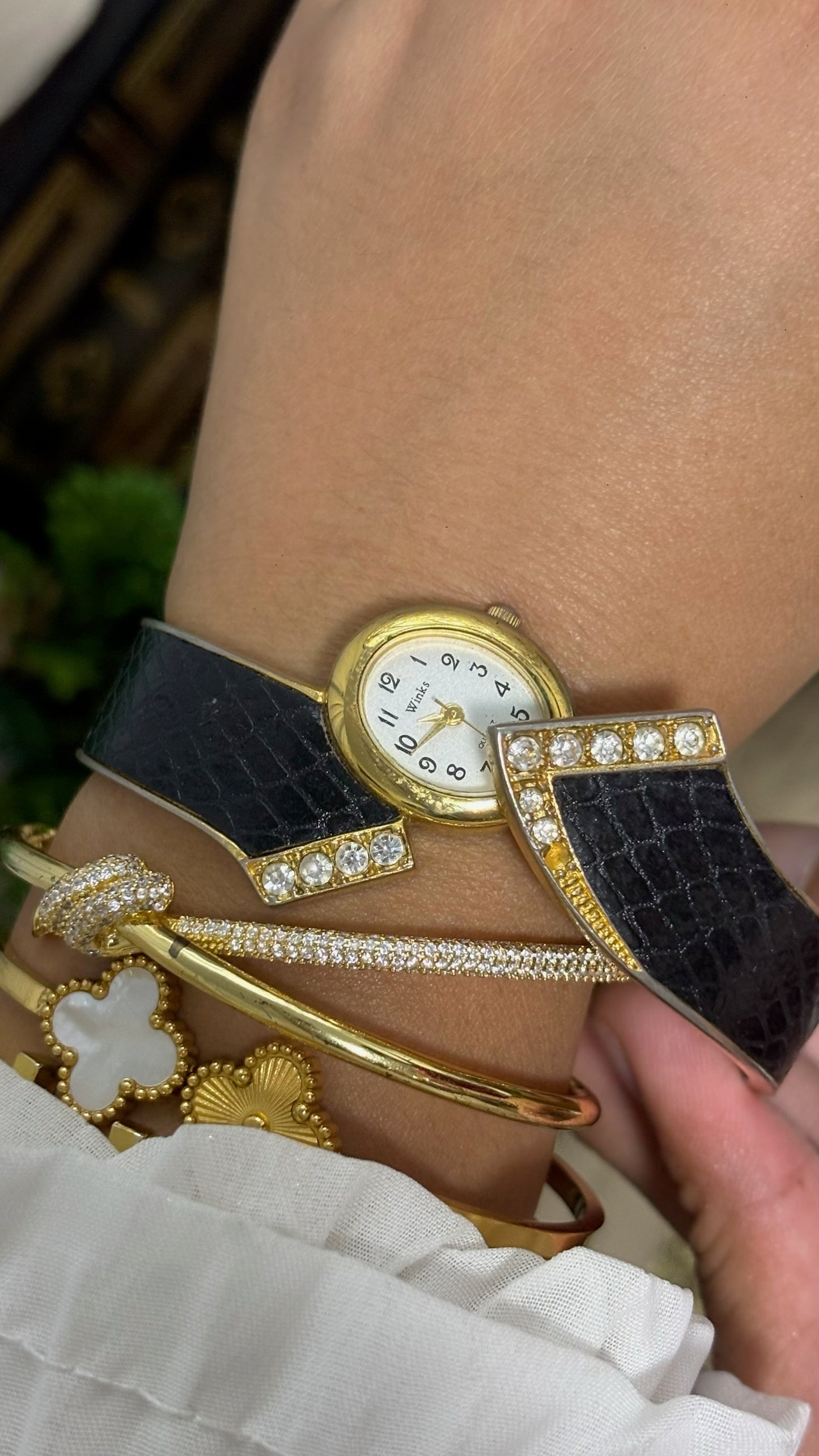 Vintage Winks Oval Watch with Crystal Accents and Black Faux-Leather Inlay Peekaboo Cuff Bracelet Quartz