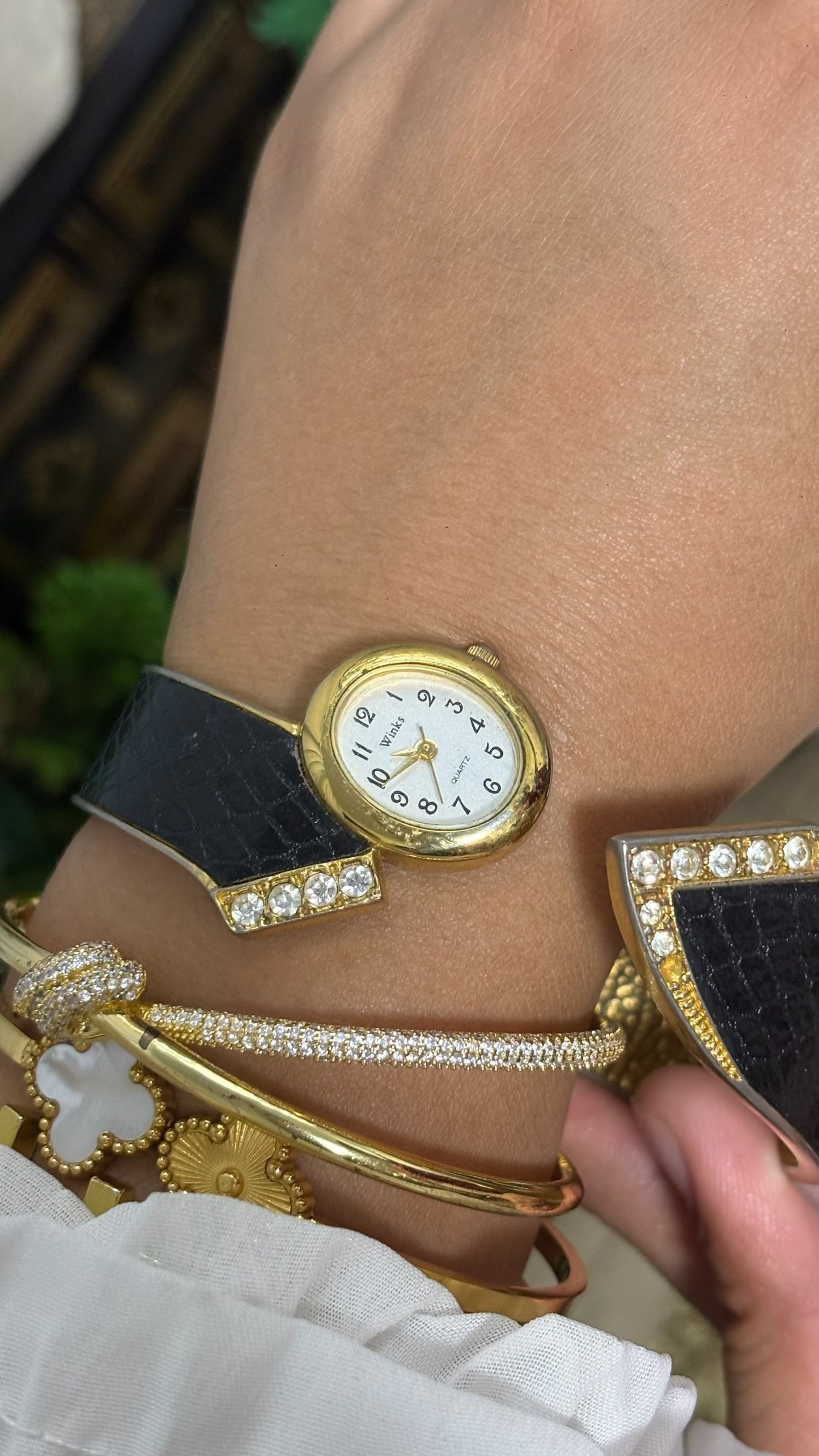Vintage Winks Oval Watch with Crystal Accents and Black Faux-Leather Inlay Peekaboo Cuff Bracelet Quartz