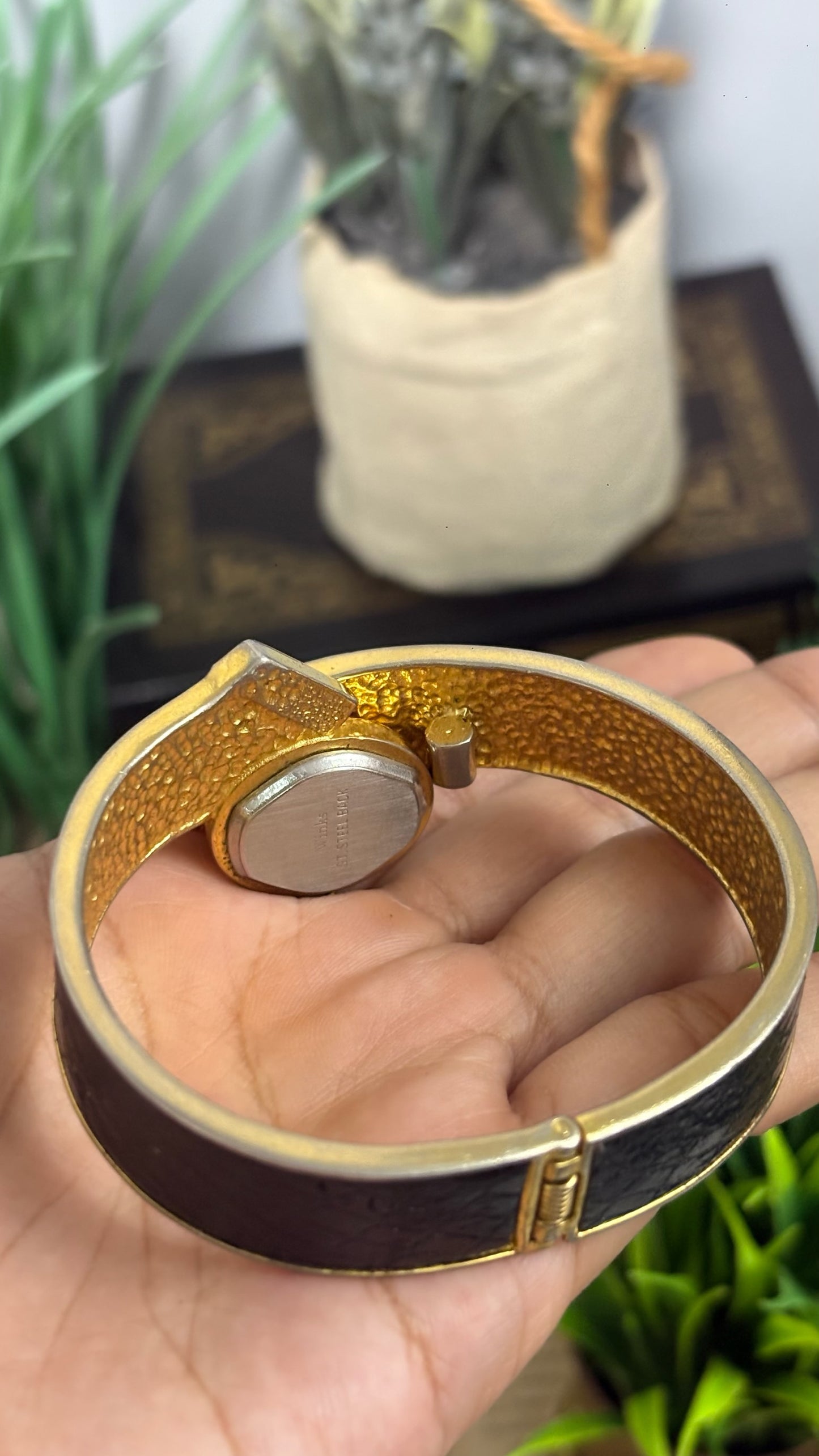 Vintage Winks Oval Watch with Crystal Accents and Black Faux-Leather Inlay Peekaboo Cuff Bracelet Quartz