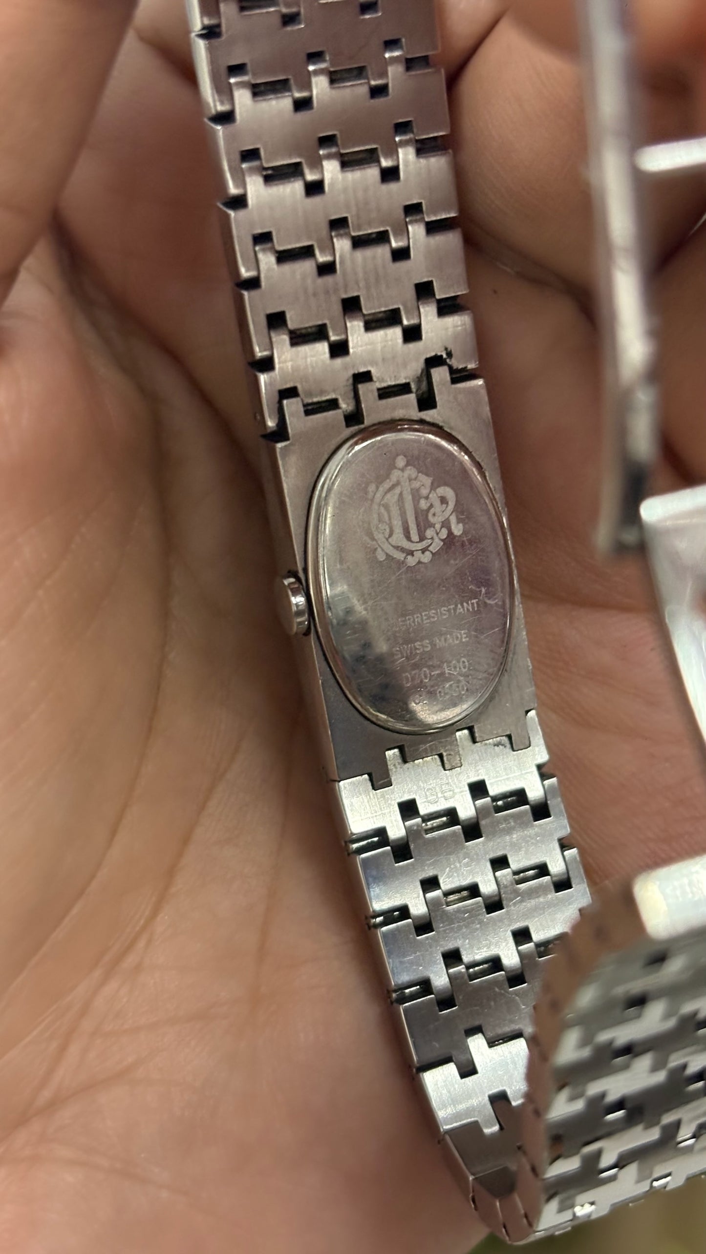 Vintage Christian Dior Oval Watch with Black Dial and Silver Tone Textured Brick Link Bracelet Swiss Made