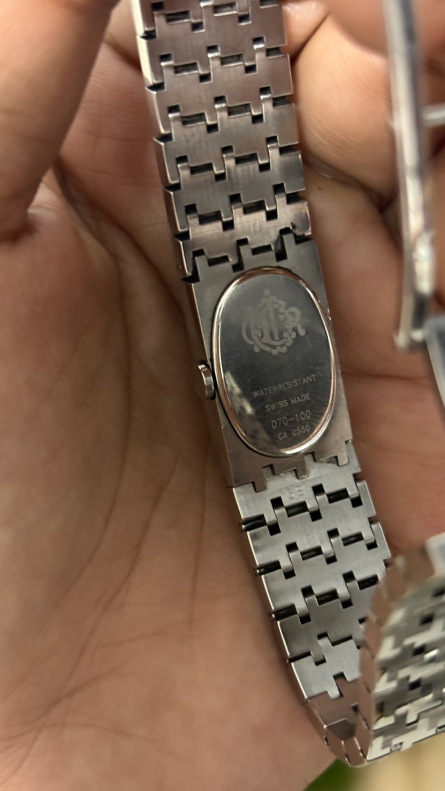 Vintage Christian Dior Oval Watch with Black Dial and Silver Tone Textured Brick Link Bracelet Swiss Made