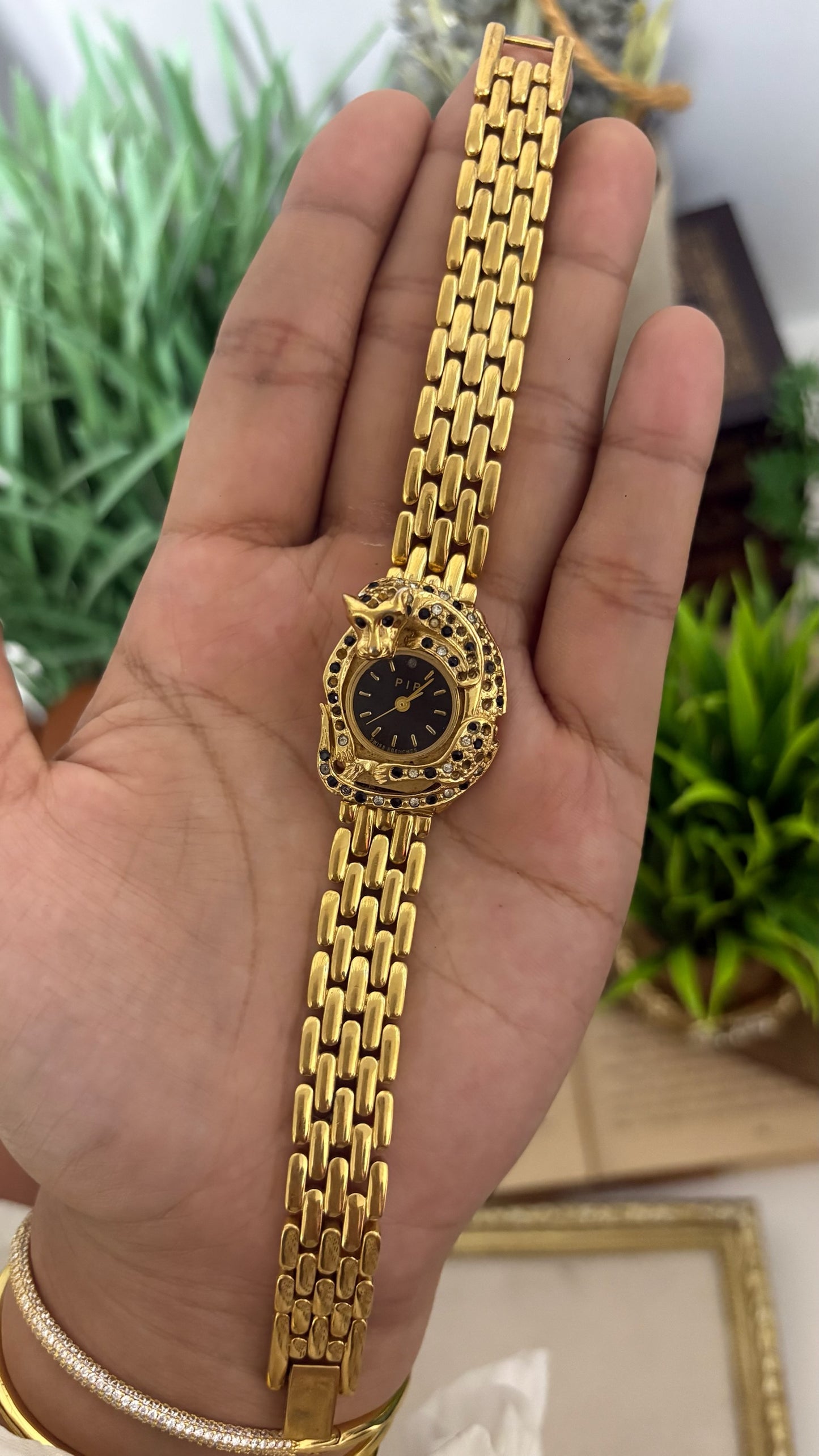 Vintage Erina Gold Tone Panther Watch with Black Dial, Crystal/Black Accents, and Linked Bracelet Quartz