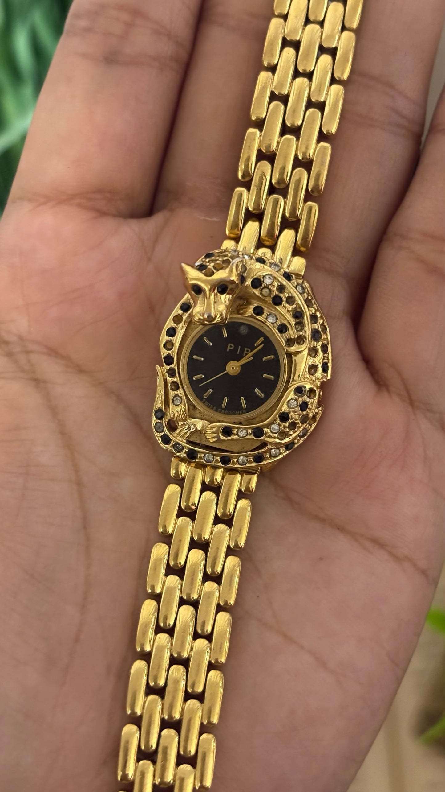 Vintage Erina Gold Tone Panther Watch with Black Dial, Crystal/Black Accents, and Linked Bracelet Quartz