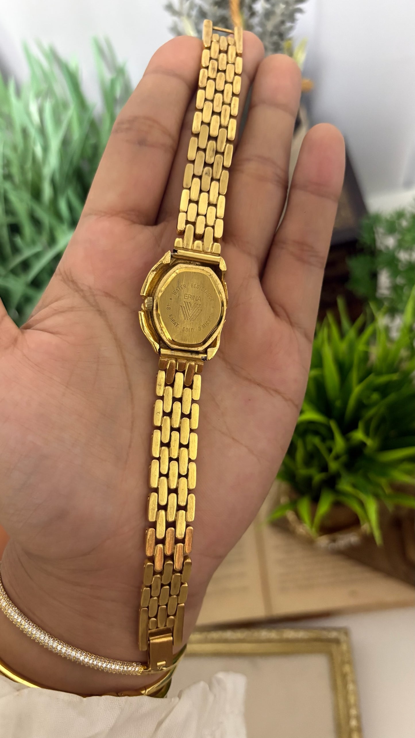 Vintage Erina Gold Tone Panther Watch with Black Dial, Crystal/Black Accents, and Linked Bracelet Quartz