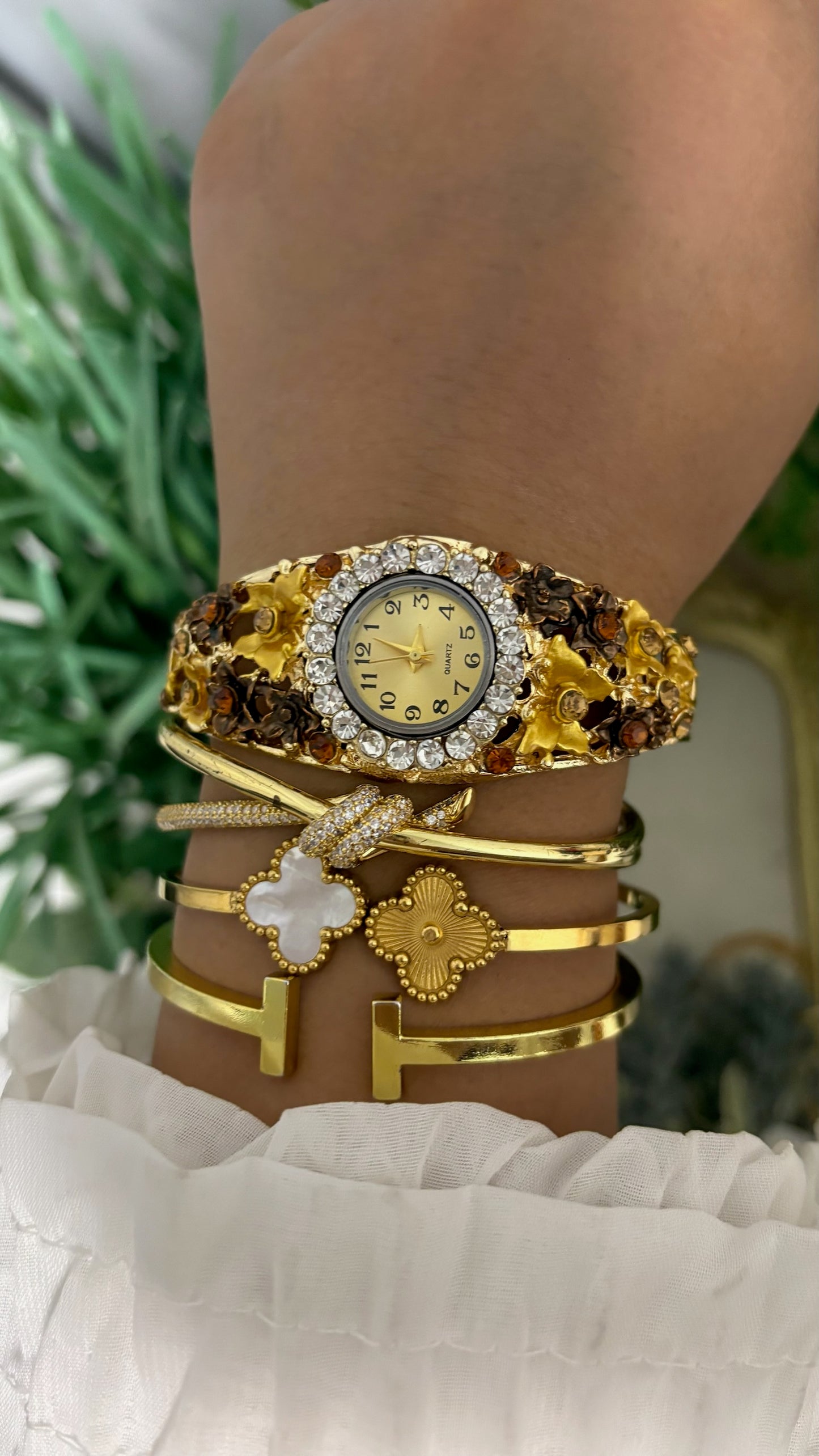 Vintage Japan Quartz Gold Tone Filigree Flower Hinged Cuff Bangle Watch with Crystal Halo Bezel and Amber Accents Quartz