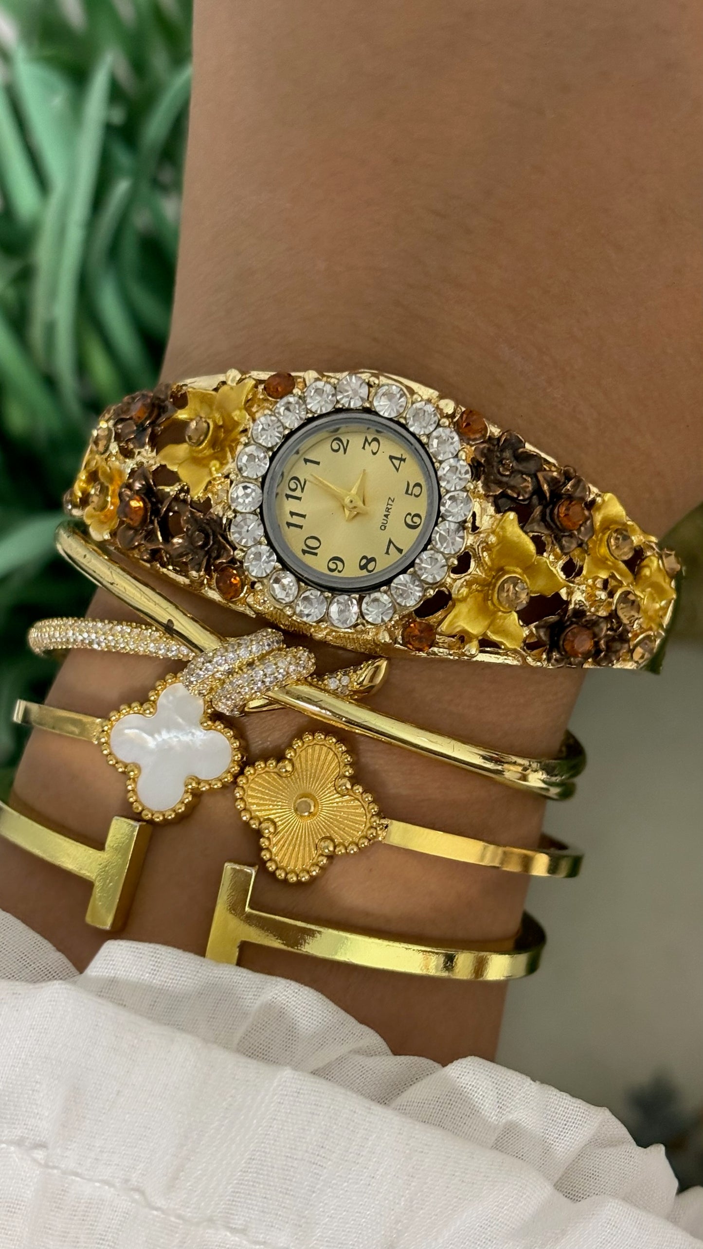 Vintage Japan Quartz Gold Tone Filigree Flower Hinged Cuff Bangle Watch with Crystal Halo Bezel and Amber Accents Quartz