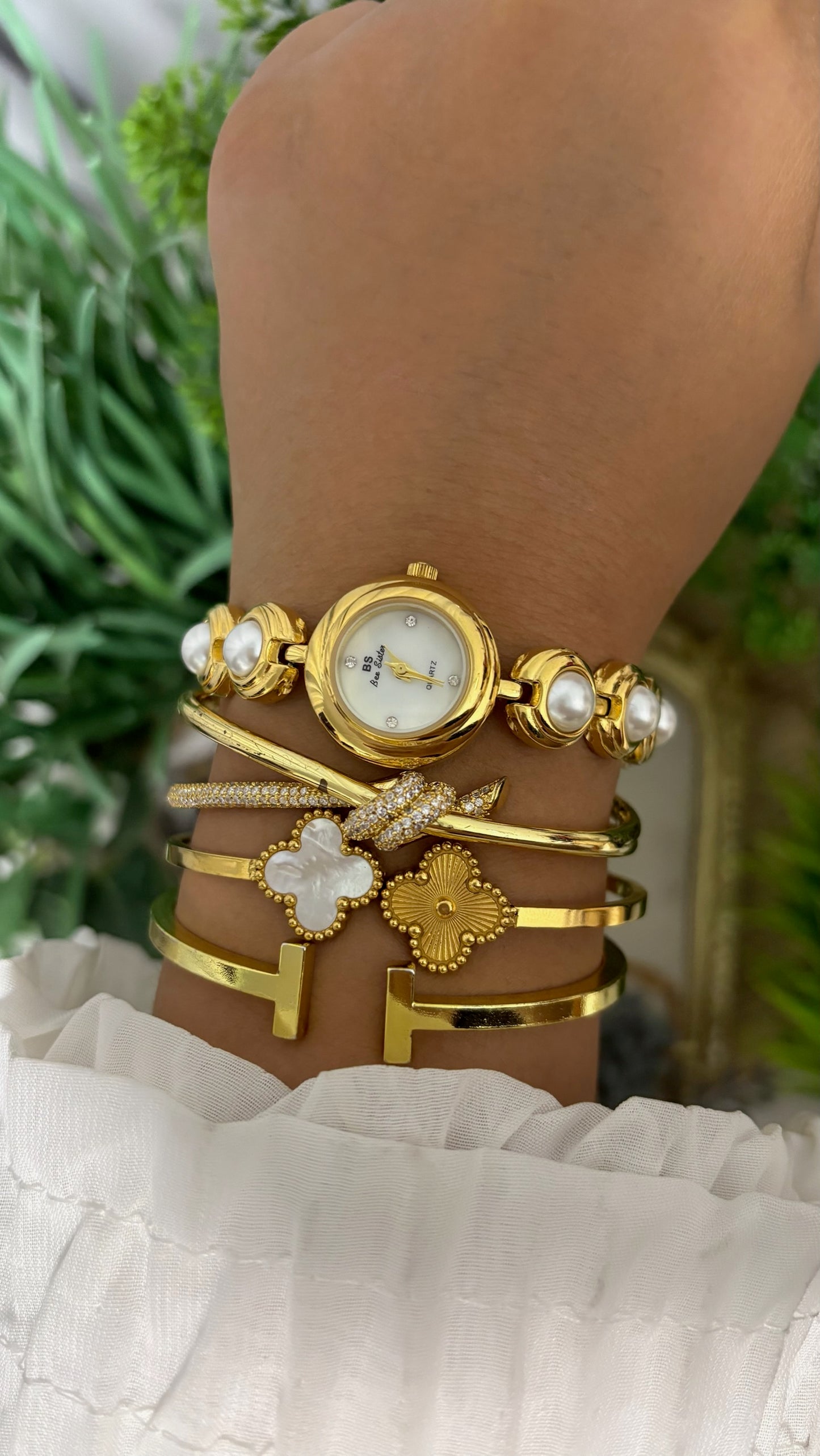 Vintage BS Bee Sister Round Watch with Mother of Pearl Dial, Tiered Step Bezel, and Gold Tone Capsule Link Bracelet Inset with Faux-Pearl Cabochons Quartz