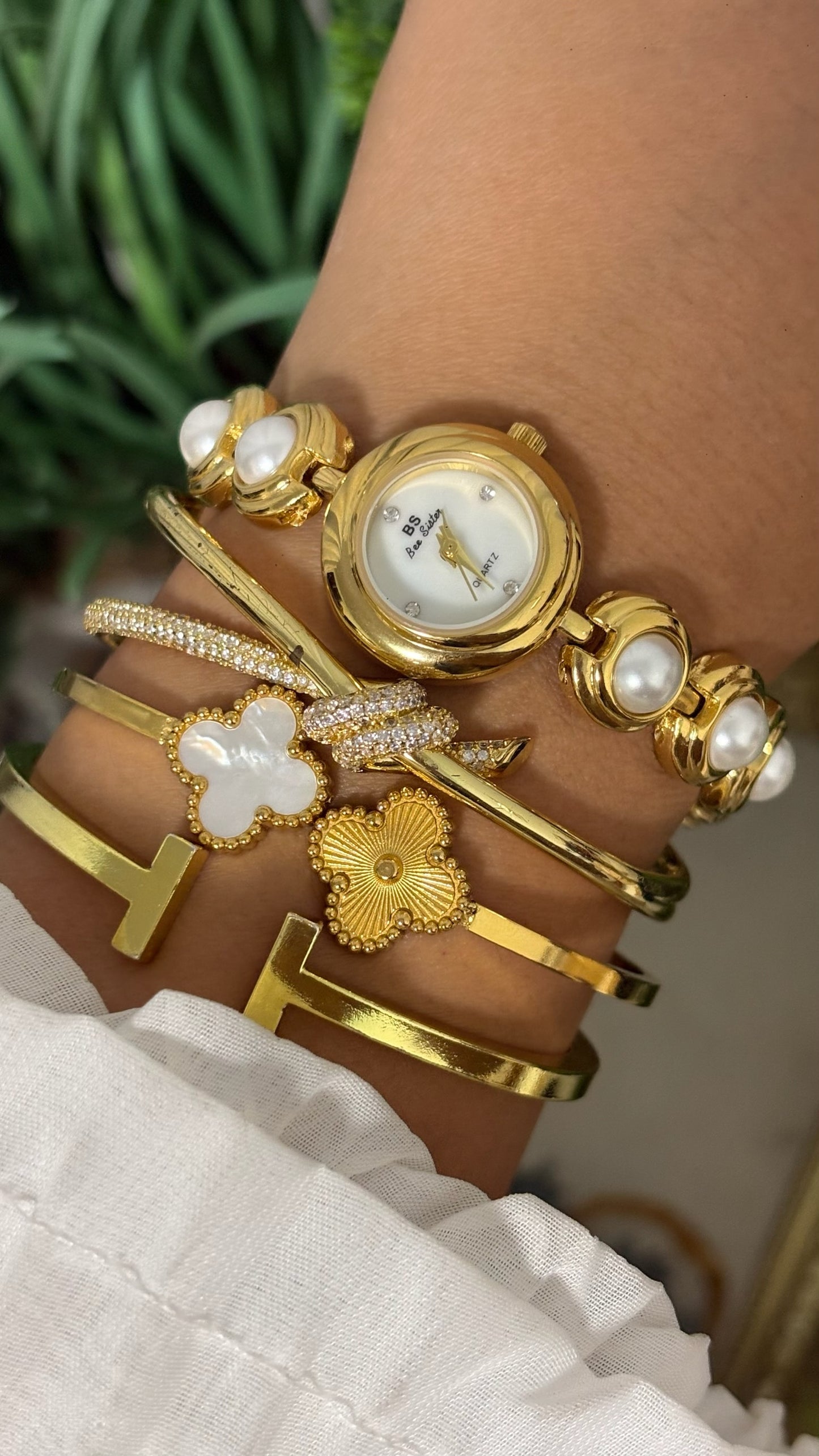 Vintage BS Bee Sister Round Watch with Mother of Pearl Dial, Tiered Step Bezel, and Gold Tone Capsule Link Bracelet Inset with Faux-Pearl Cabochons Quartz