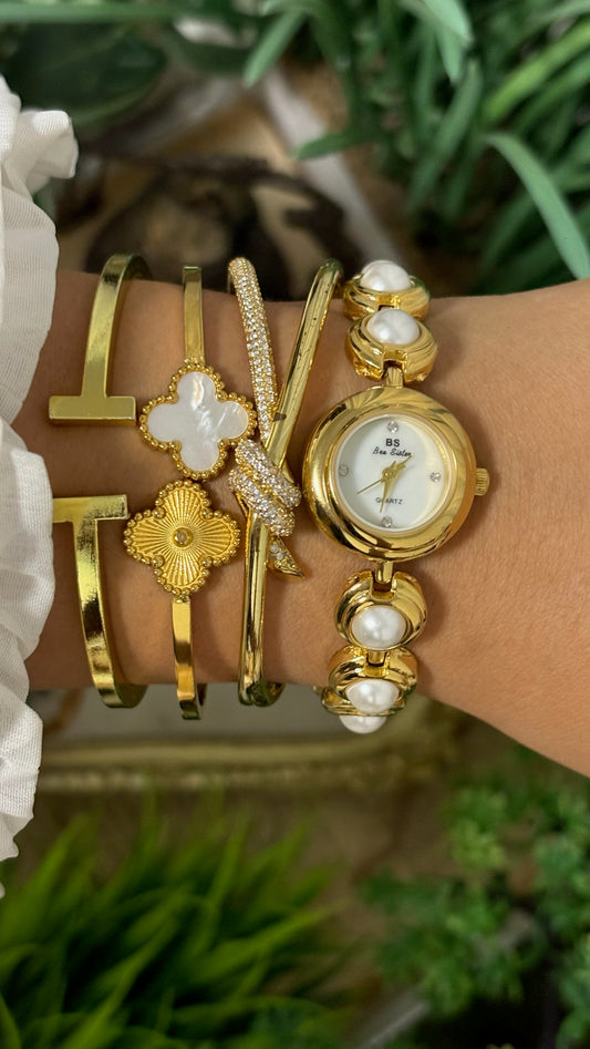 Vintage BS Bee Sister Round Watch with Mother of Pearl Dial, Tiered Step Bezel, and Gold Tone Capsule Link Bracelet Inset with Faux-Pearl Cabochons Quartz