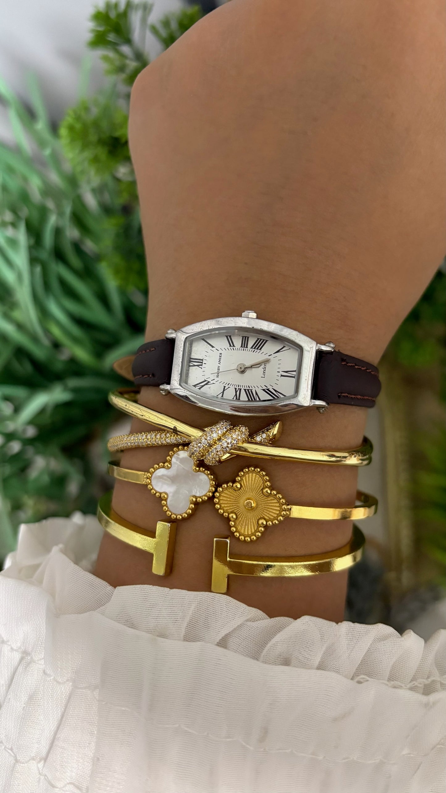 Vintage Hardy Amies London Tonneau Watch with White Dial Roman Numerals Silver Tone Case and Brown Leather Strap Quartz
