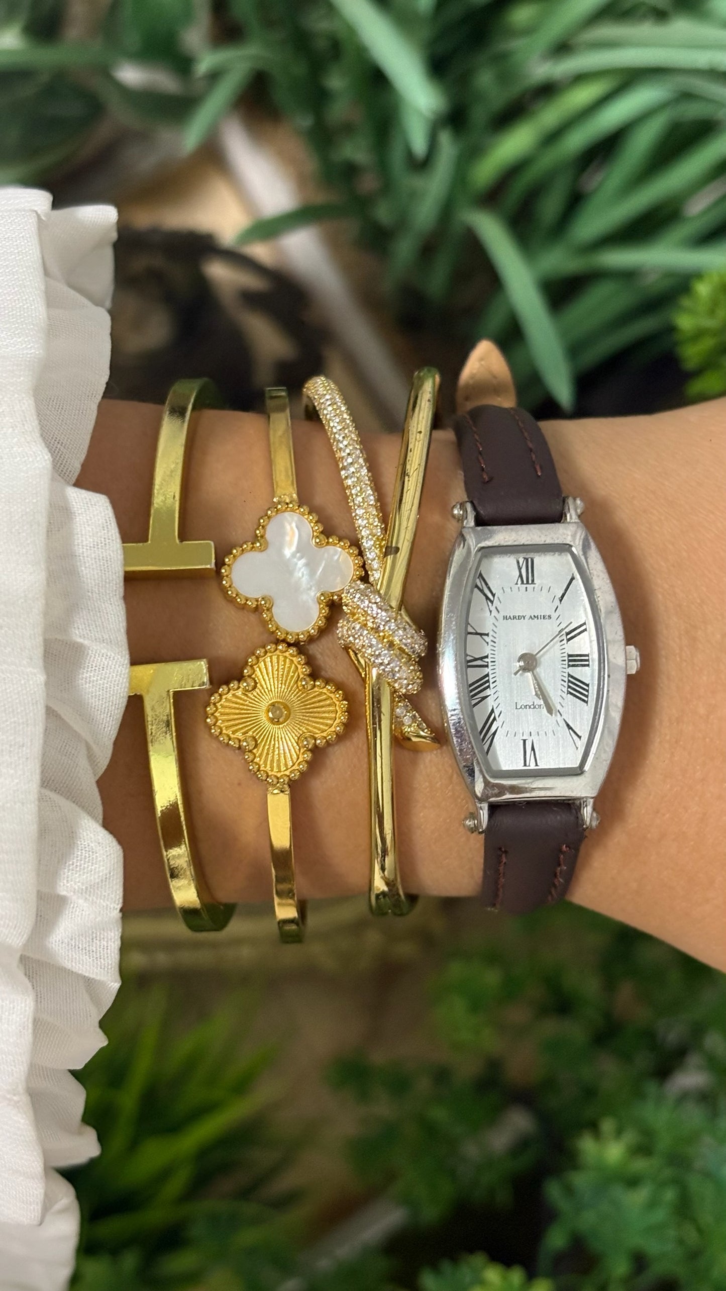 Vintage Hardy Amies London Tonneau Watch with White Dial Roman Numerals Silver Tone Case and Brown Leather Strap Quartz