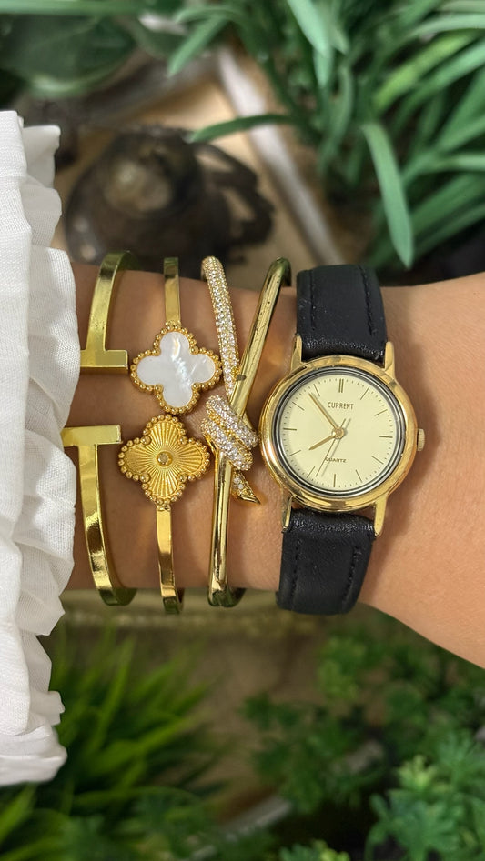 Vintage Current Round Watch with Light Gold Dial Polished Gold Tone Case Slim Stick Markers and Textured Black Leather Strap Quartz