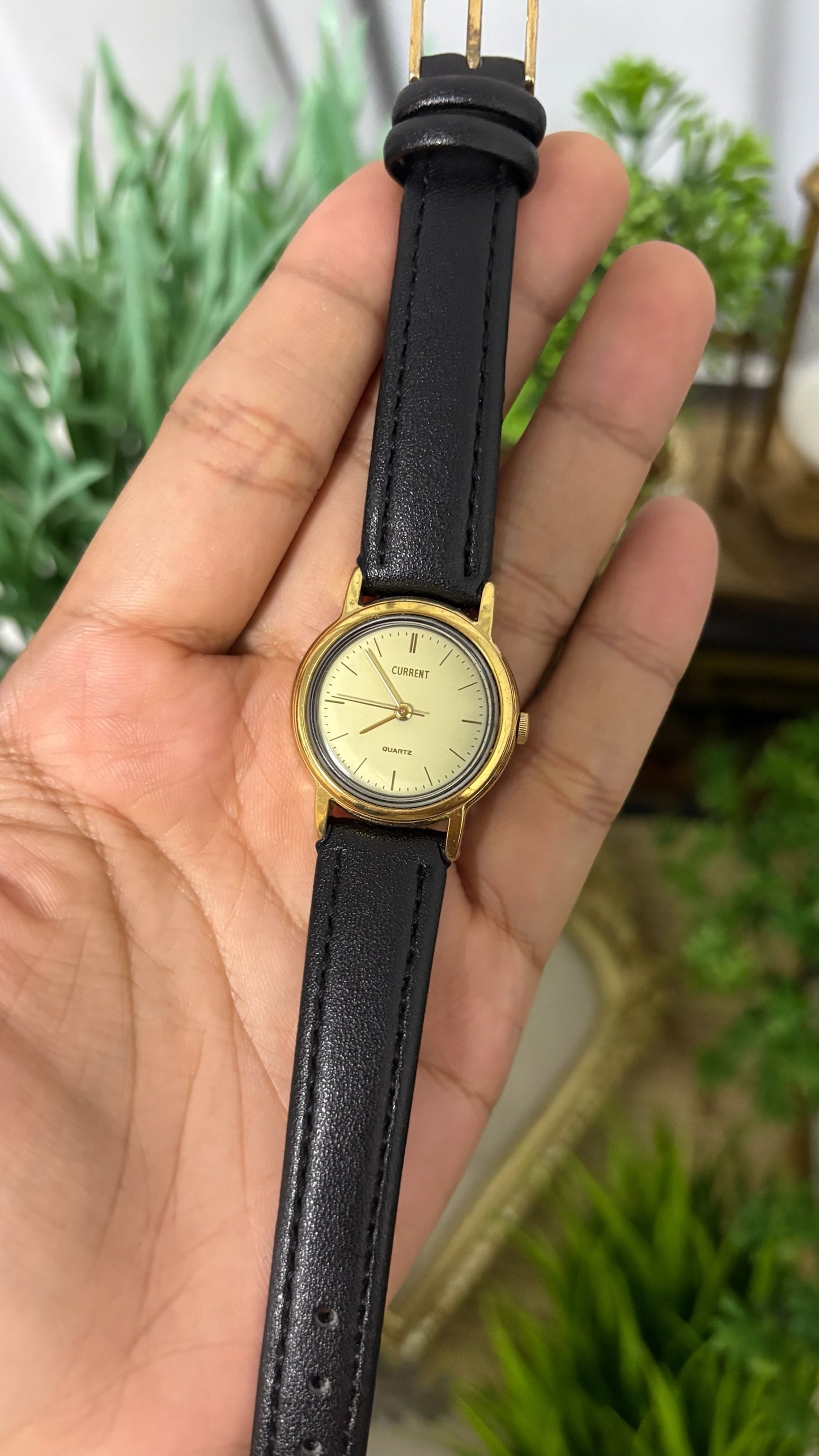 Vintage Current Round Watch with Light Gold Dial Polished Gold Tone Case Slim Stick Markers and Textured Black Leather Strap Quartz