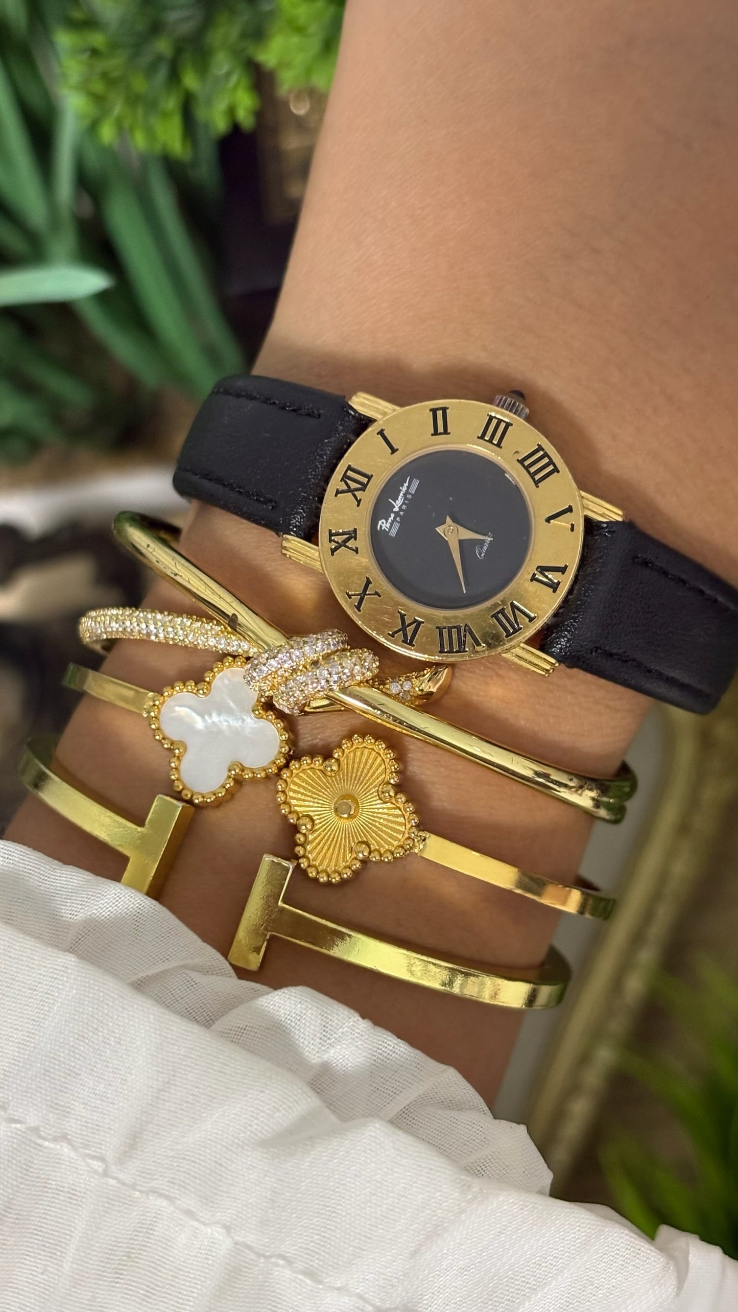 Vintage Pierre Lannier Paris Round Watch with Matte Black Dial Wide Gold Tone Roman Numeral Bezel Alpha Hands and Smooth Black Leather Strap Quartz