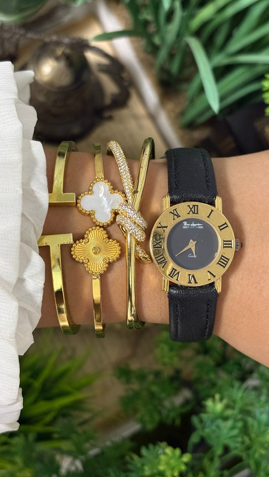 Vintage Pierre Lannier Paris Round Watch with Matte Black Dial Wide Gold Tone Roman Numeral Bezel Alpha Hands and Smooth Black Leather Strap Quartz