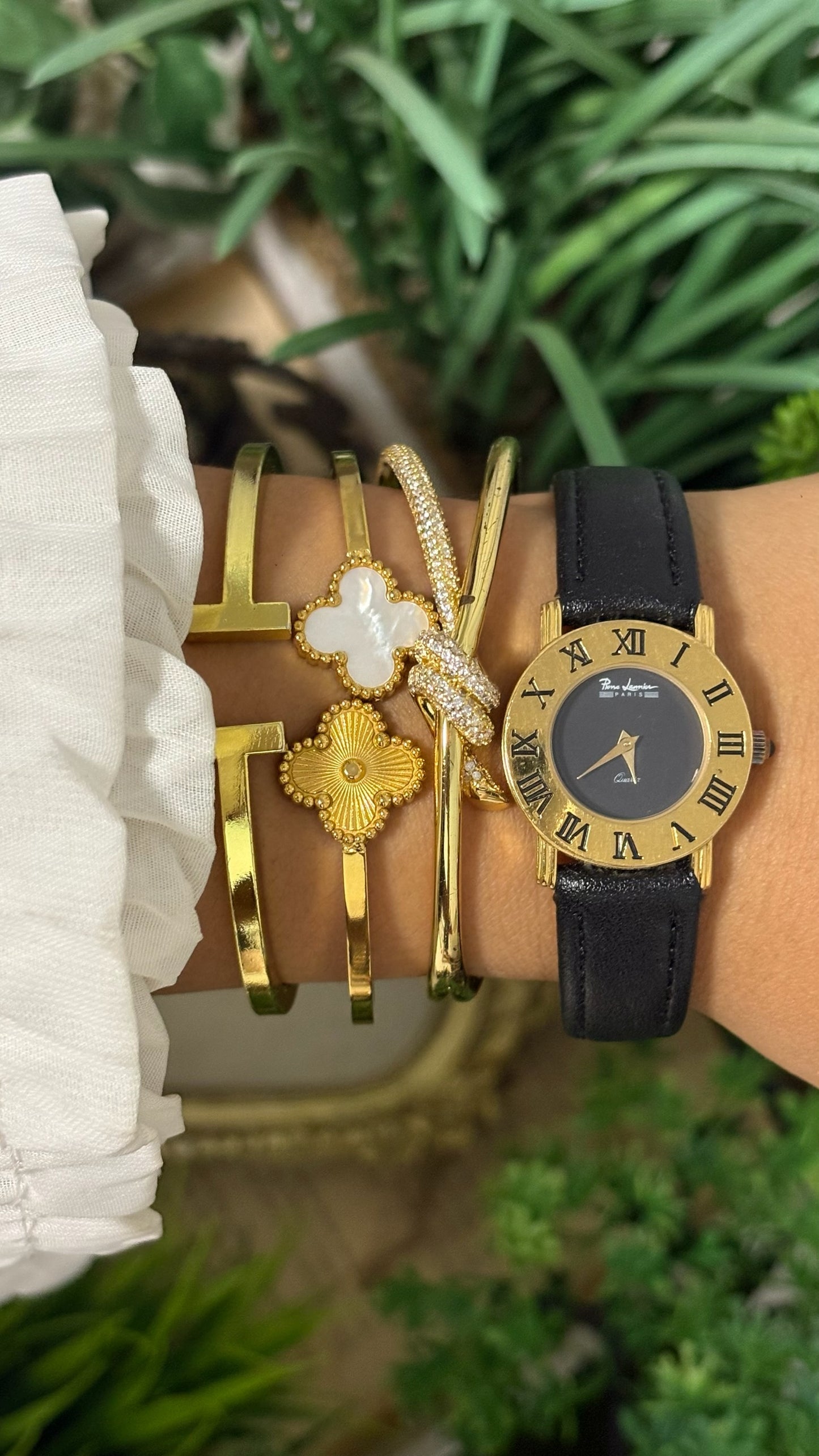 Vintage Pierre Lannier Paris Round Watch with Matte Black Dial Wide Gold Tone Roman Numeral Bezel Alpha Hands and Smooth Black Leather Strap Quartz