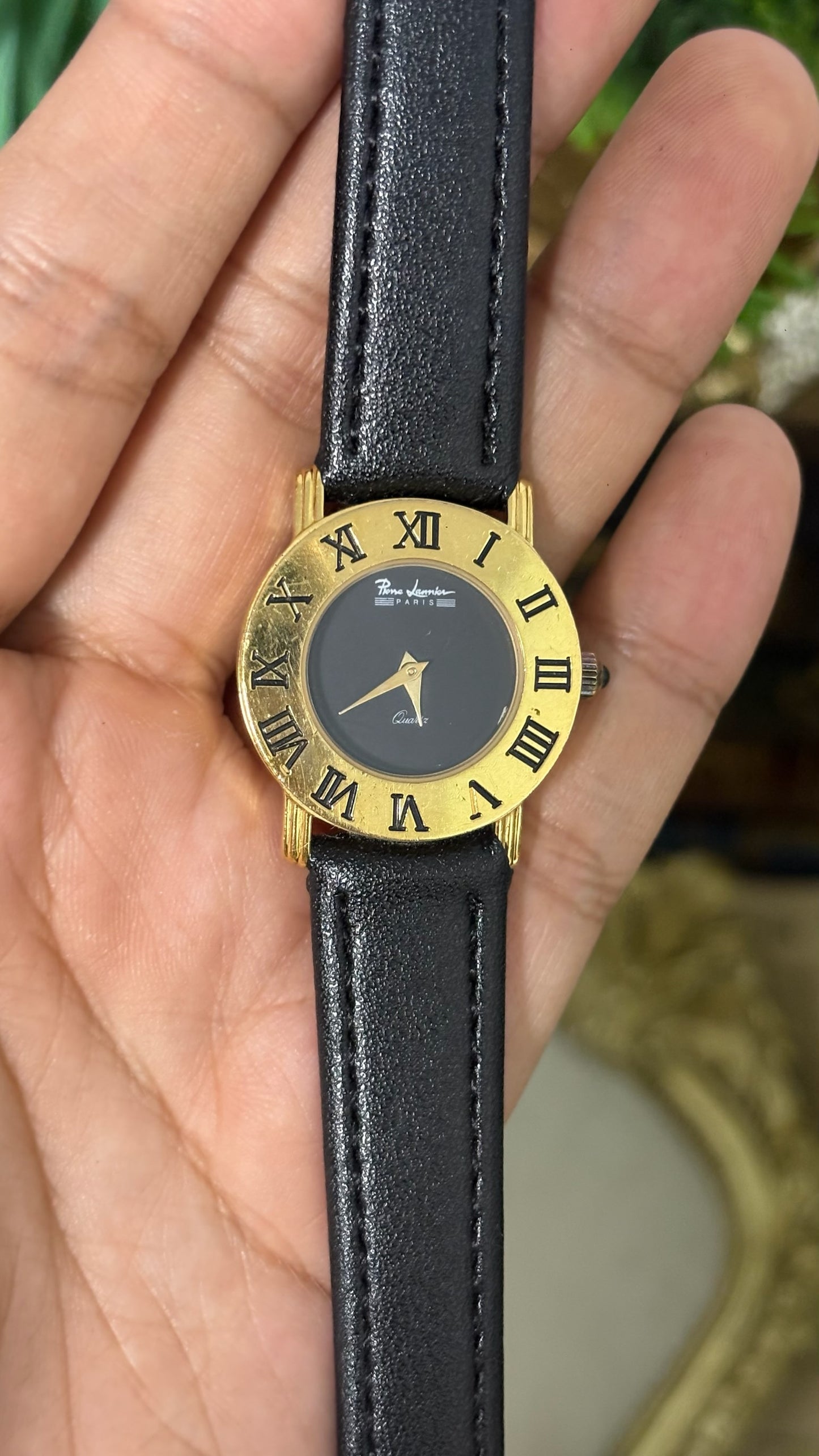 Vintage Pierre Lannier Paris Round Watch with Matte Black Dial Wide Gold Tone Roman Numeral Bezel Alpha Hands and Smooth Black Leather Strap Quartz