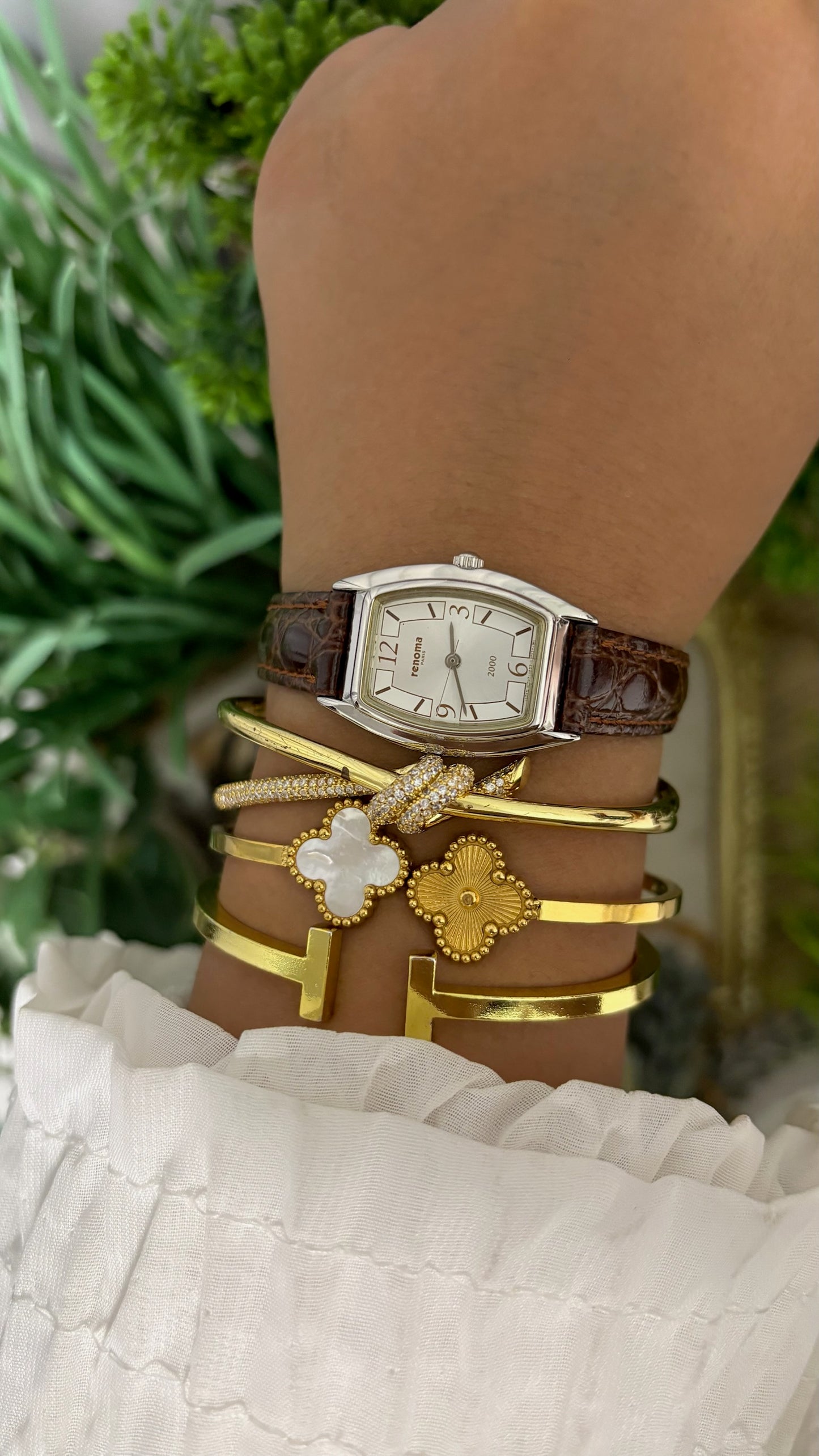 Vintage Renoma Paris Tonneau Watch with Silver Tone Dial Exploding Arabic Numerals Polished Silver Tone Case and Brown Croc Embossed Leather Strap Quartz