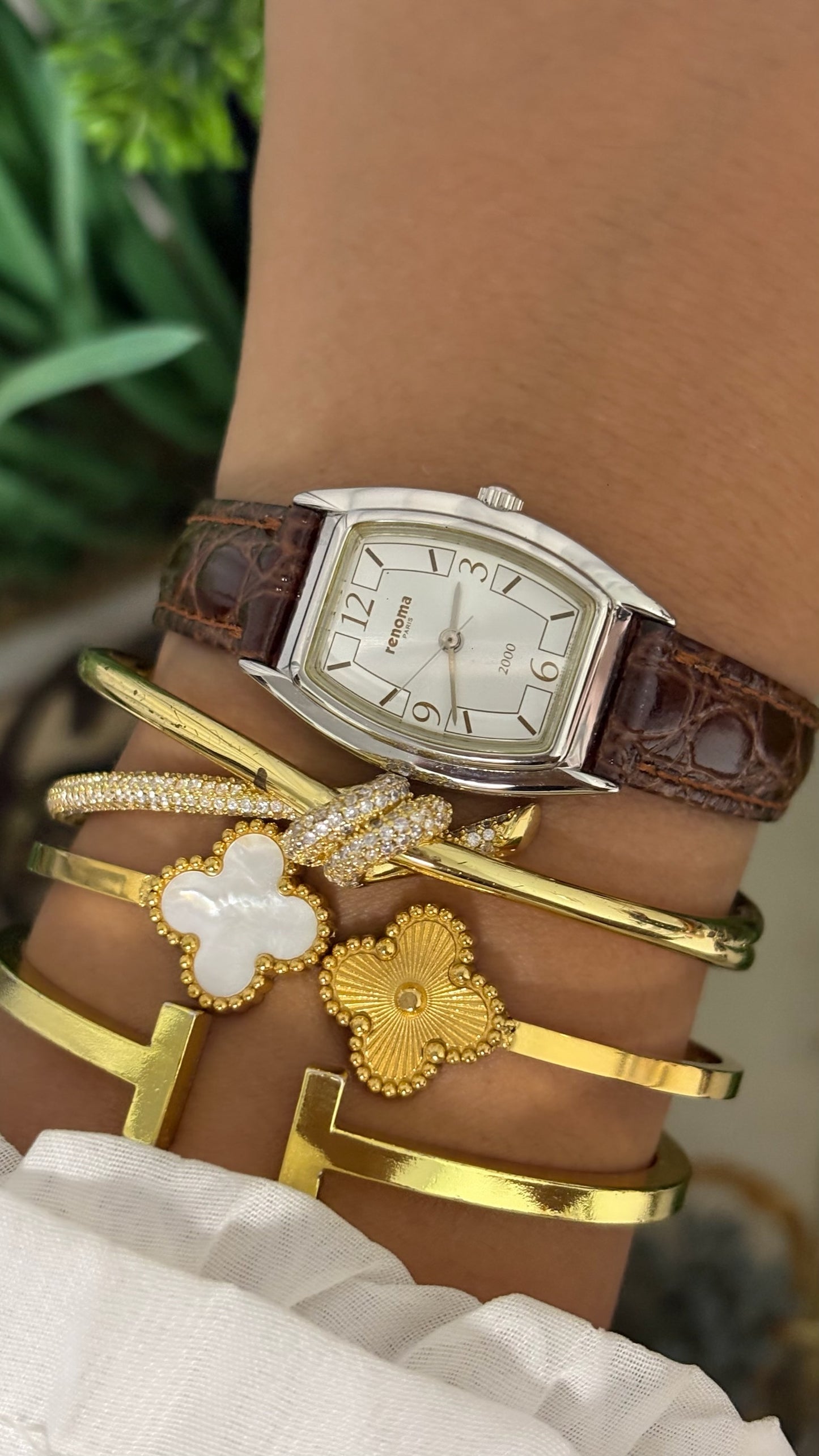 Vintage Renoma Paris Tonneau Watch with Silver Tone Dial Exploding Arabic Numerals Polished Silver Tone Case and Brown Croc Embossed Leather Strap Quartz