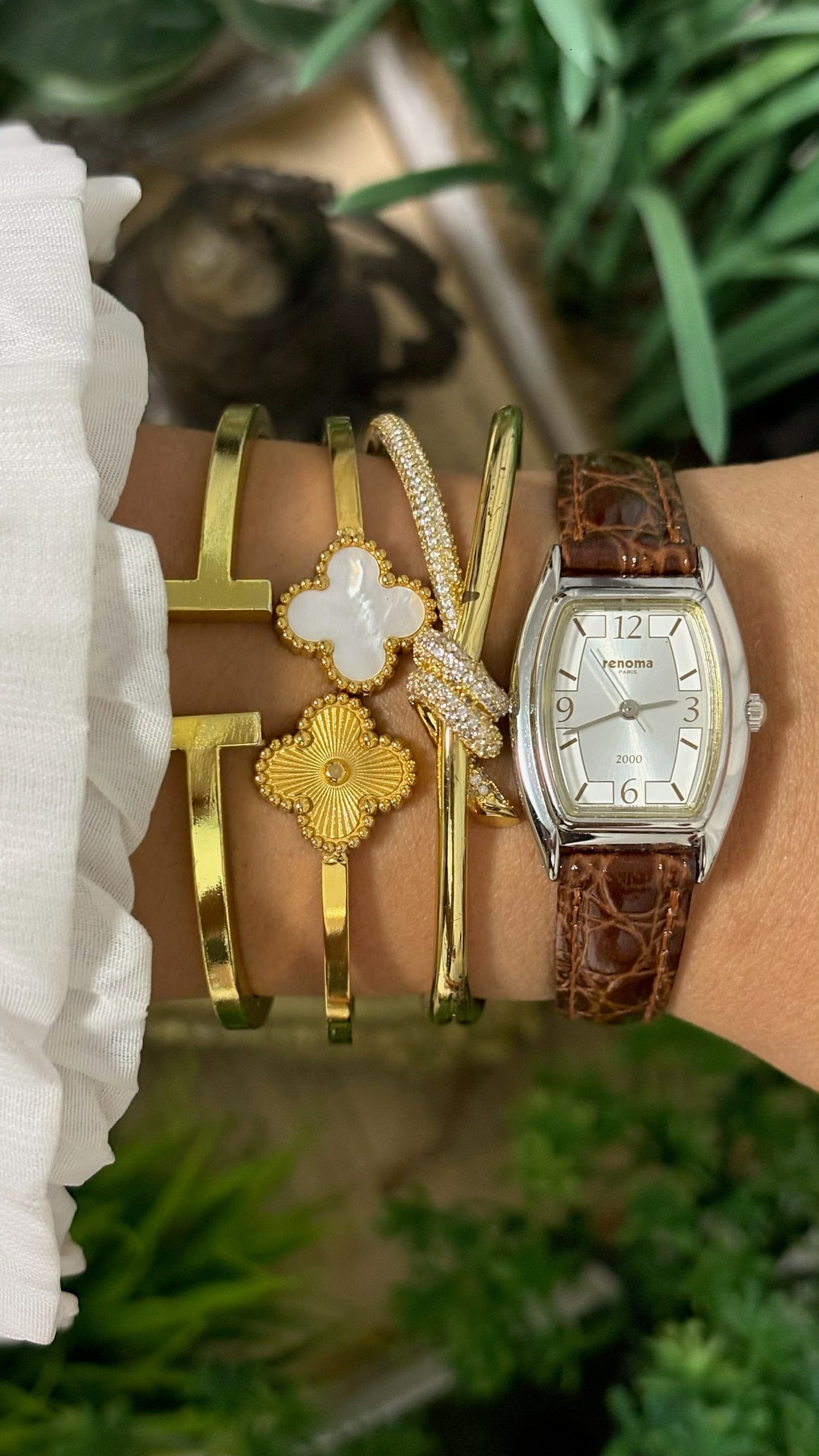 Vintage Renoma Paris Tonneau Watch with Silver Tone Dial Exploding Arabic Numerals Polished Silver Tone Case and Brown Croc Embossed Leather Strap Quartz