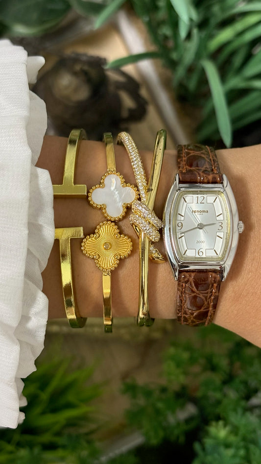 Vintage Renoma Paris Tonneau Watch with Silver Tone Dial Exploding Arabic Numerals Polished Silver Tone Case and Brown Croc Embossed Leather Strap Quartz