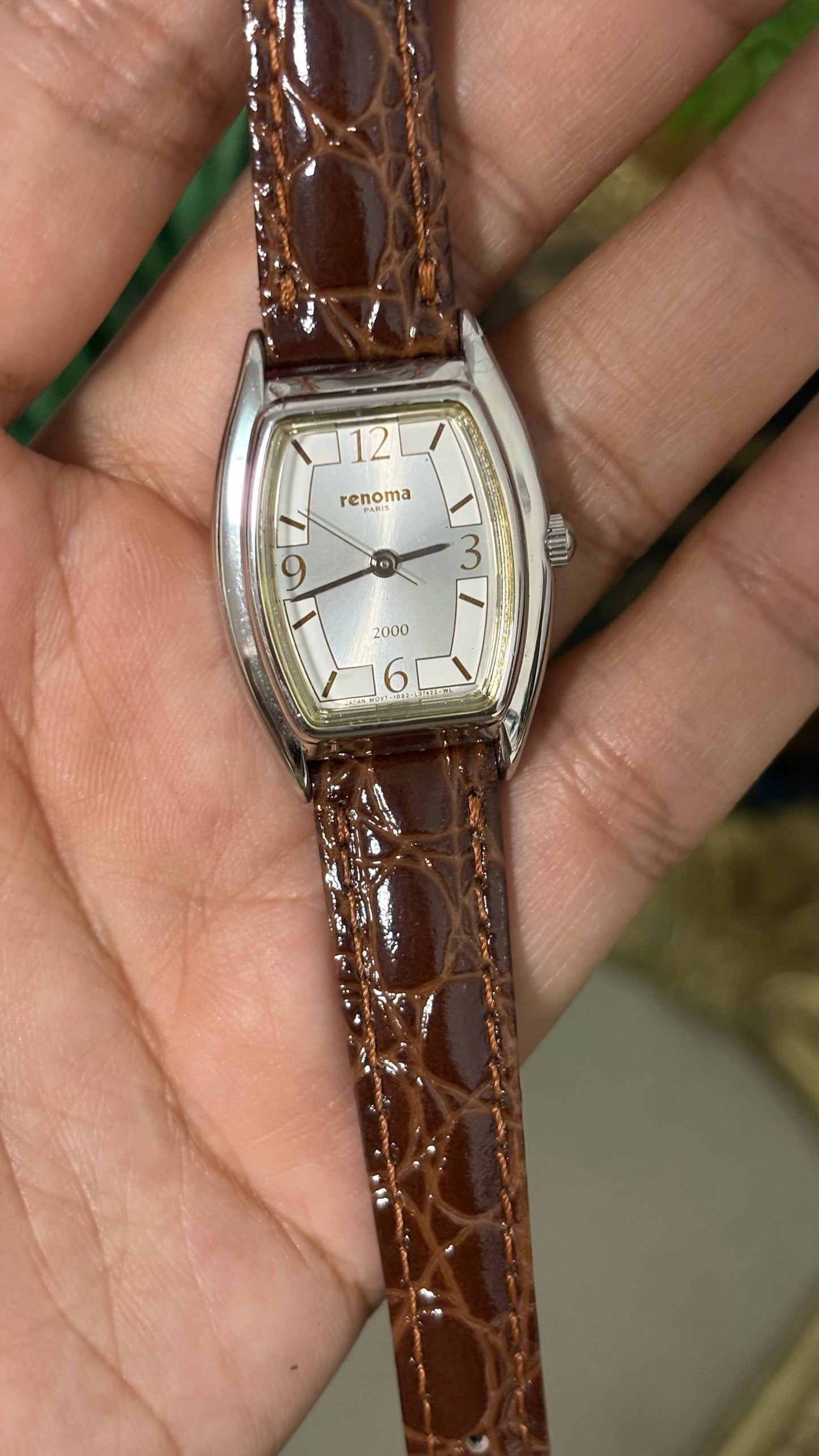 Vintage Renoma Paris Tonneau Watch with Silver Tone Dial Exploding Arabic Numerals Polished Silver Tone Case and Brown Croc Embossed Leather Strap Quartz