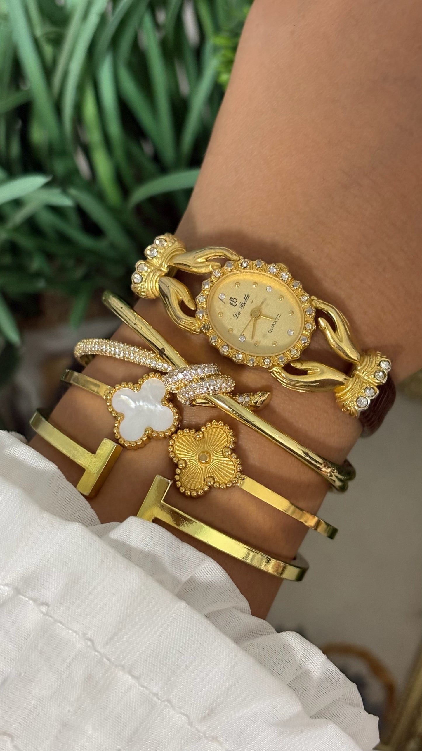 Vintage La Belle Oval Watch with Gold Tone Dial Crystal Halo Bezel Ornate Hands Shape Case Accents and Crystal Set Bow End Links Quartz