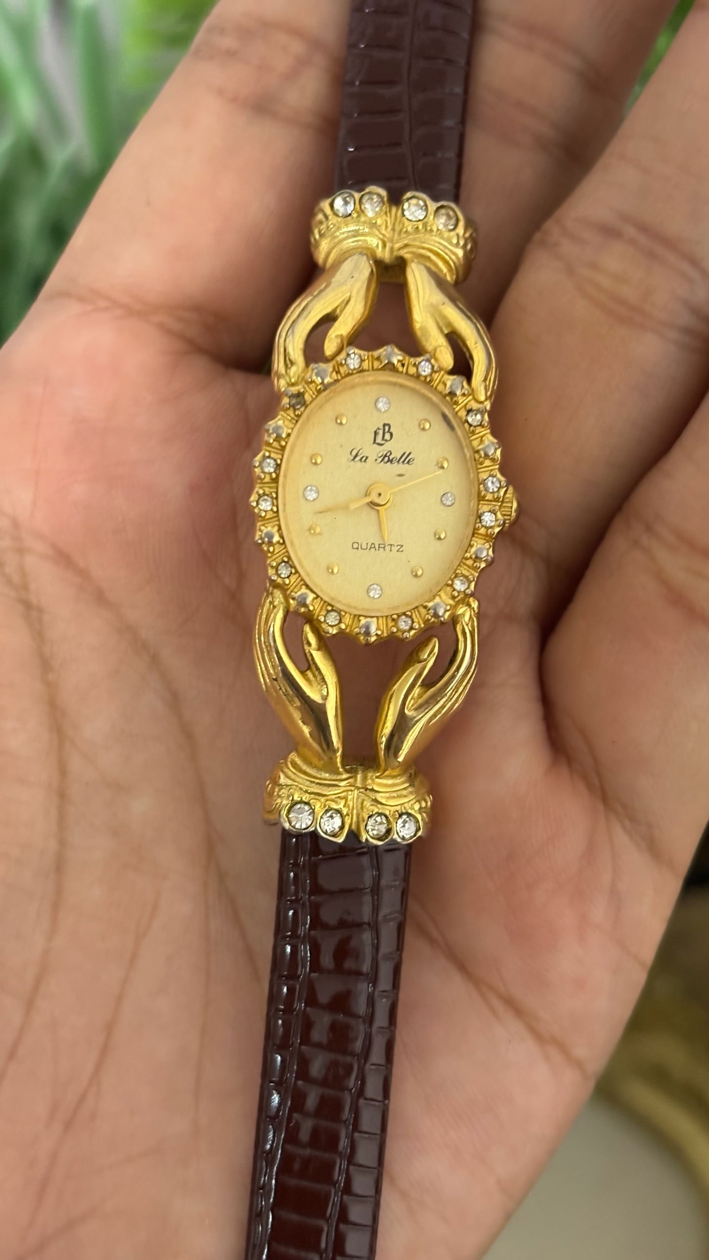 Vintage La Belle Oval Watch with Gold Tone Dial Crystal Halo Bezel Ornate Hands Shape Case Accents and Crystal Set Bow End Links Quartz