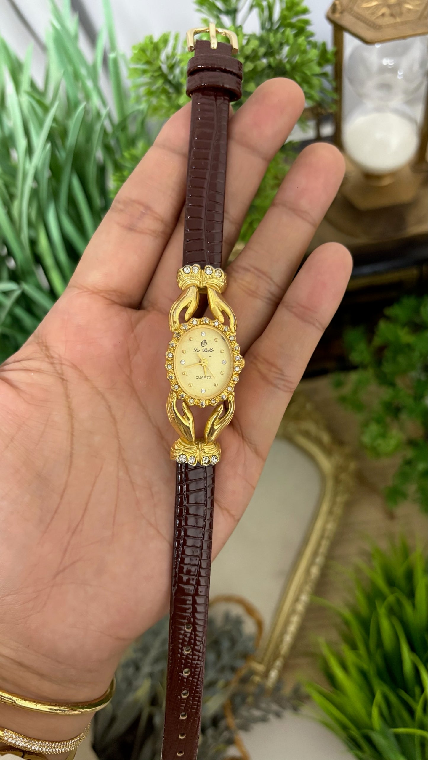 Vintage La Belle Oval Watch with Gold Tone Dial Crystal Halo Bezel Ornate Hands Shape Case Accents and Crystal Set Bow End Links Quartz