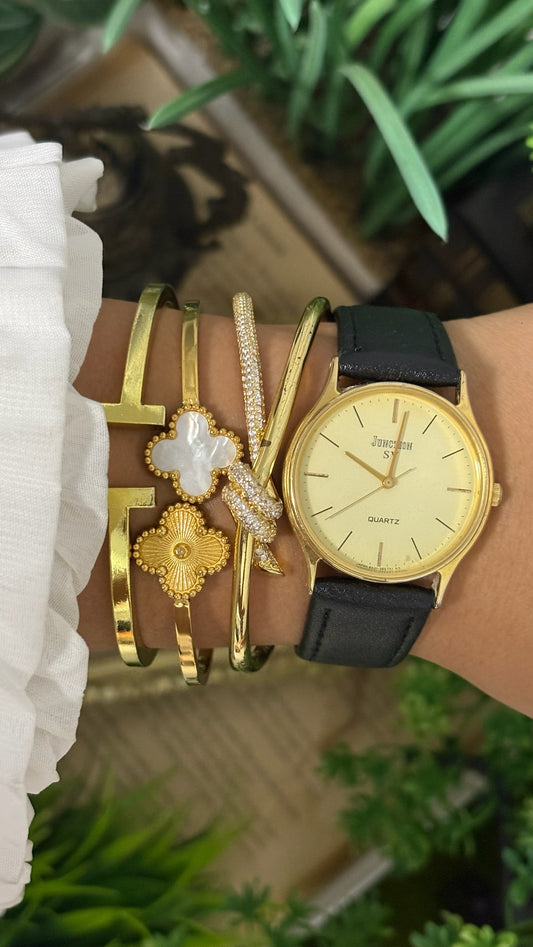 Vintage Vega Mens Junction SV Round Watch with Gold Tone Dial Minimalist Stick Markers Polished Gold Tone Case and Smooth Black Leather Strap Quartz