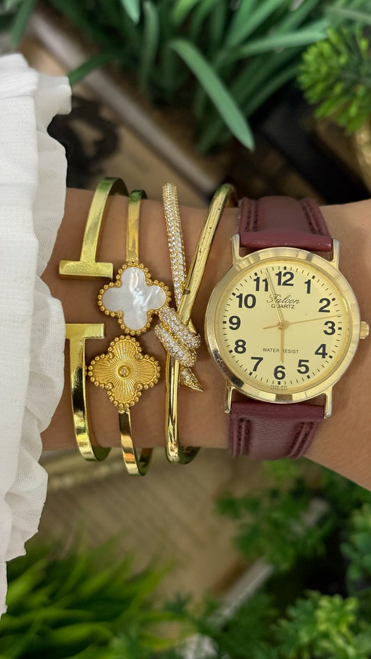 Vintage Q&Q Falcon Mens Round Watch with Champagne Dial Full Arabic Numerals Polished Gold Tone Case and Smooth Maroon Leather Strap Quartz