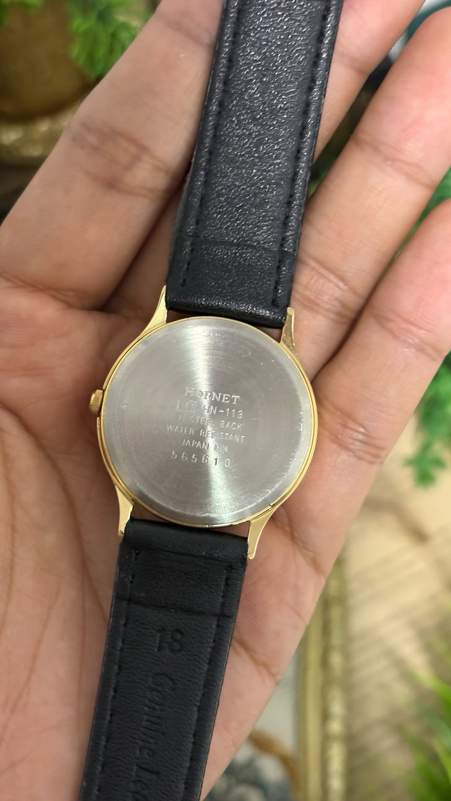 Vintage Hornet Round Watch with White Dial Minimalist Stick Markers Polished Gold Tone Case and Smooth Black Leather Strap Quartz