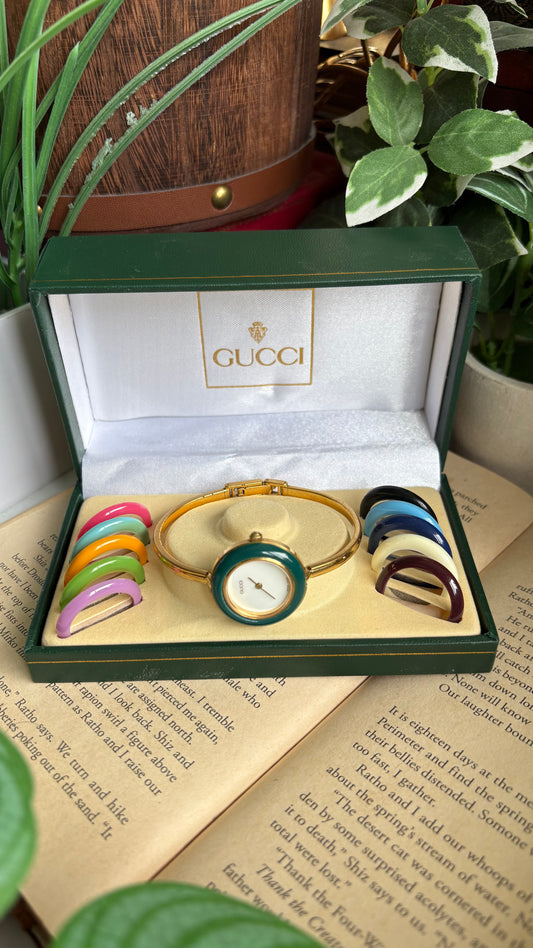 Vintage Gucci 1100L Interchangeable Bezel Set Bangle Watch in Gold Tone
