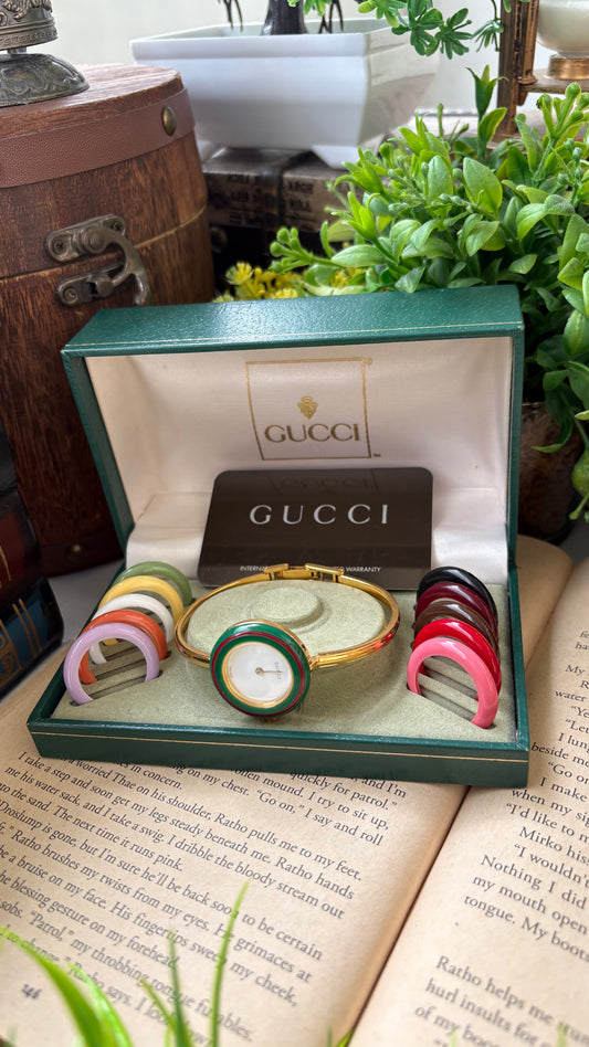 Extremely Rare Vintage Gucci 1100L Interchangeable Cherry Line Bezel Set Bangle Watch in Gold Tone
