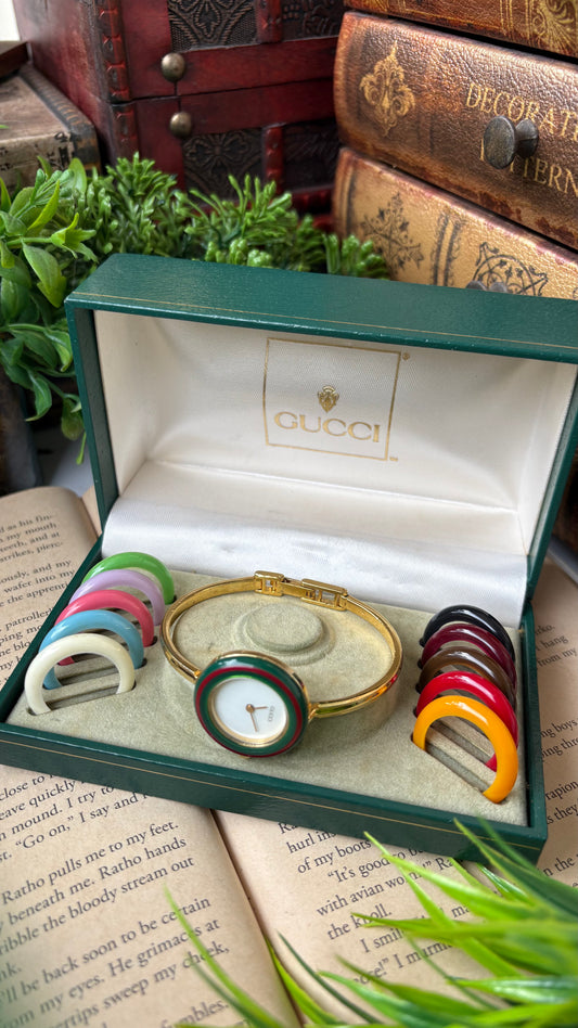 Extremely Rare Vintage Gucci 1100L Interchangeable Cherry Line Bezel Set Bangle Watch in Gold Tone