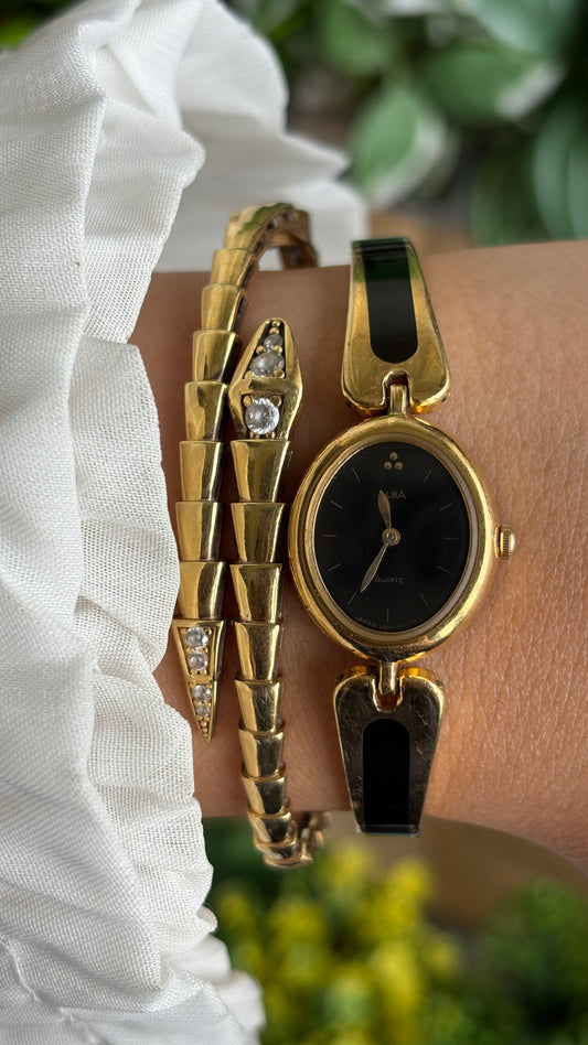 Extremely Rare Vintage Alba by Seiko Watch in Gold Tone Black Dial Oval Face